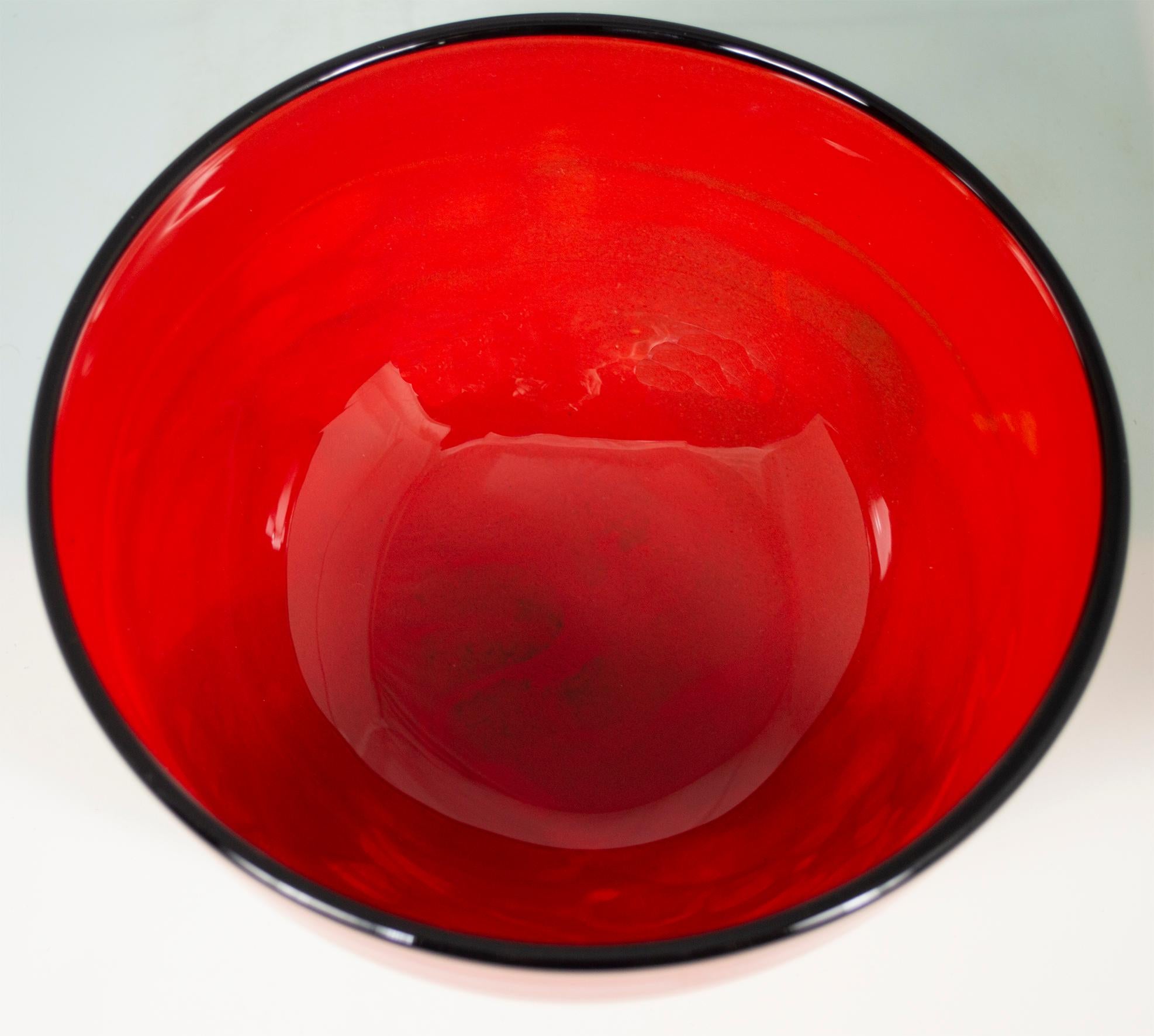 Drawing inspiration from the gestural composition techniques of Abstract Expressionism, Ioan Nemtoi's 'Red Bowl' features a brilliant array of colors that seem to shift before the observer's very eyes. Because all of his pieces are hand-blown, no