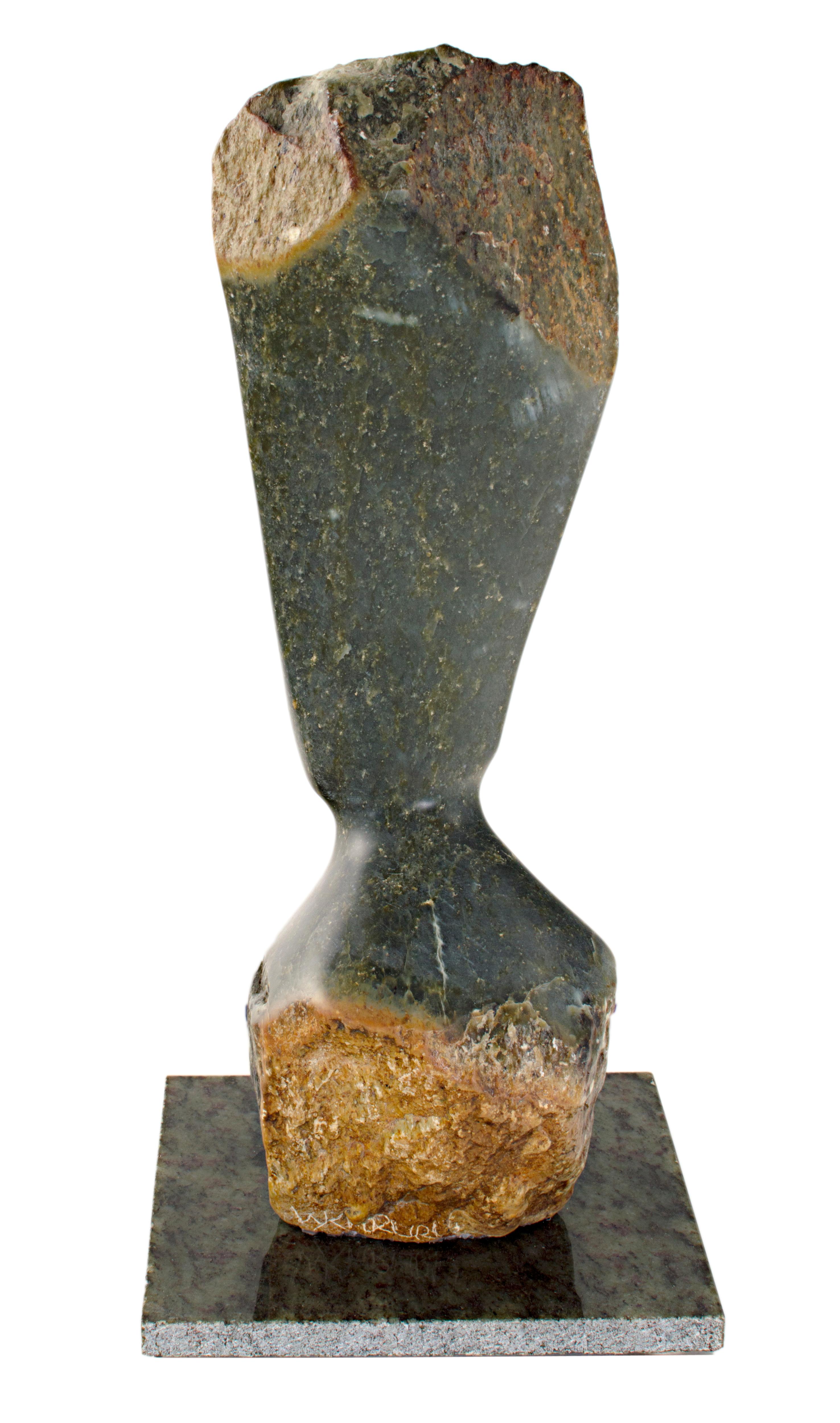 'Proud Woman' is an original opal serpentine sculpture by the Zimbabwean artist Wellington Karuru. In the sculpture, the figure's head leans to one side, eyes closed, as if carefully listening to the viewer. The head of the figure is carved onto a