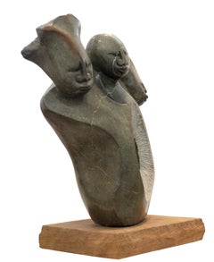 'Sharing One Heart' original opal serpentine sculpture by Tichona Nyakambangwe