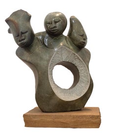 'Sharing One Heart' original opal serpentine sculpture by Tichona Nyakambangwe