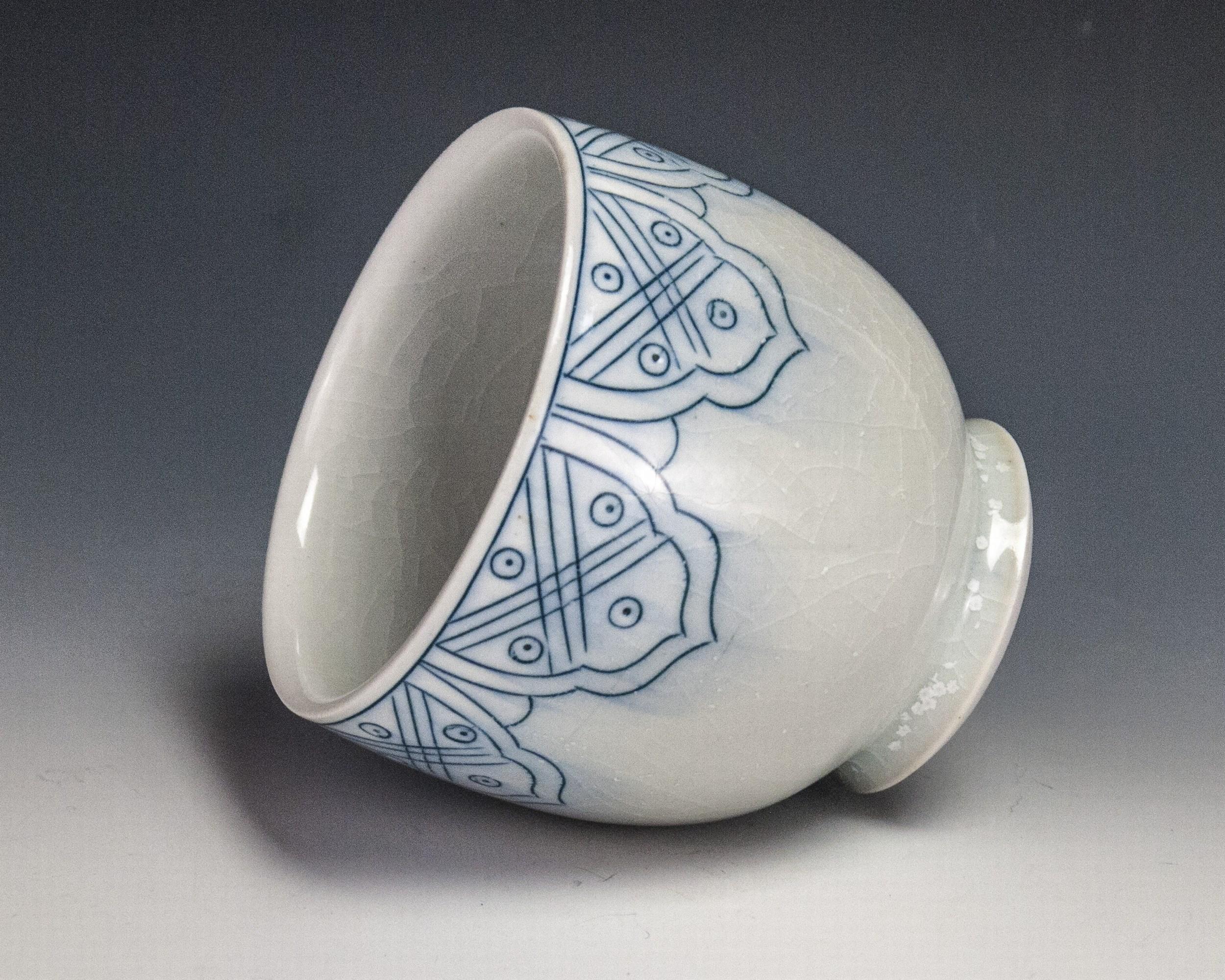 Sgraffito 
Materials: Porcelain and Glaze
Date: 2018

Steven Young Lee has been the resident artist director of the Archie Bray Foundation for the Ceramic Arts in Helena, Montana since 2006. In 2004-05, he lectured and taught at numerous