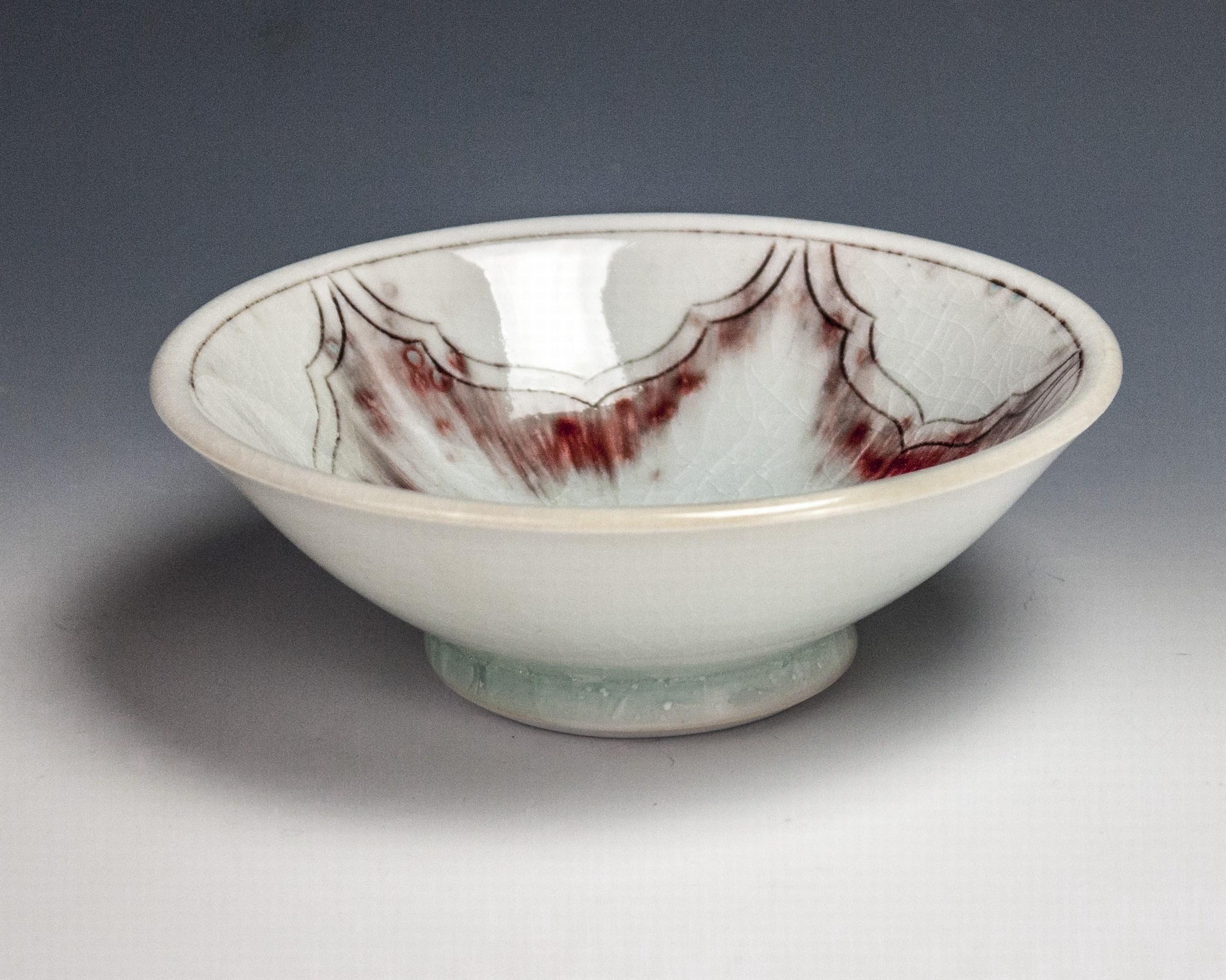 Red Dish
Materials: Porcelain and Glaze
Date: 2018

Steven Young Lee has been the resident artist director of the Archie Bray Foundation for the Ceramic Arts in Helena, Montana since 2006. In 2004-05, he lectured and taught at numerous universities