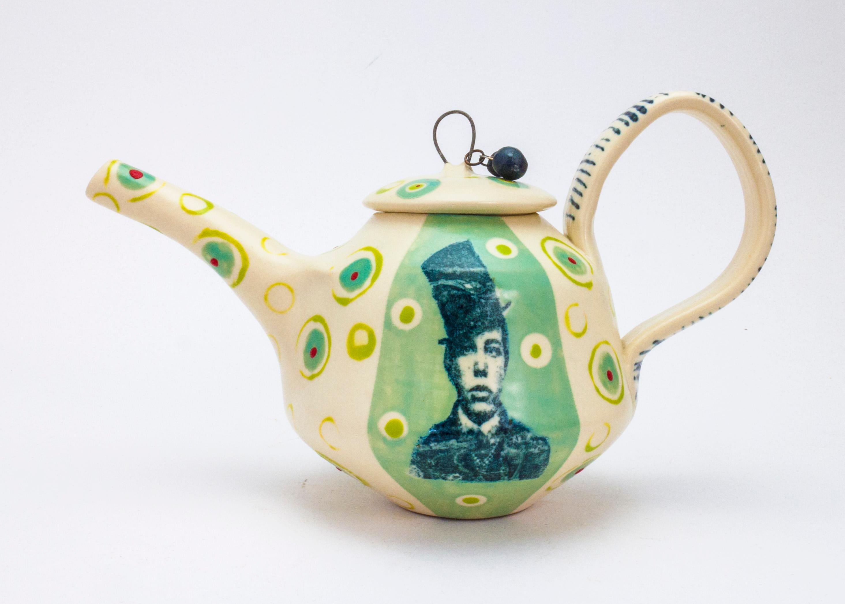 Theresa Robinson
Title: Lithograph printed Teapot with Stand 
Materials: Porcelain
Date: 2018
Dimensions: 5 X 9