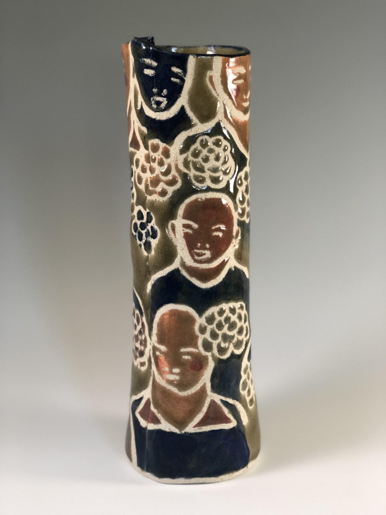 Elizabeth Currer Figurative Sculpture - Tall Cylinder with People and Flowers