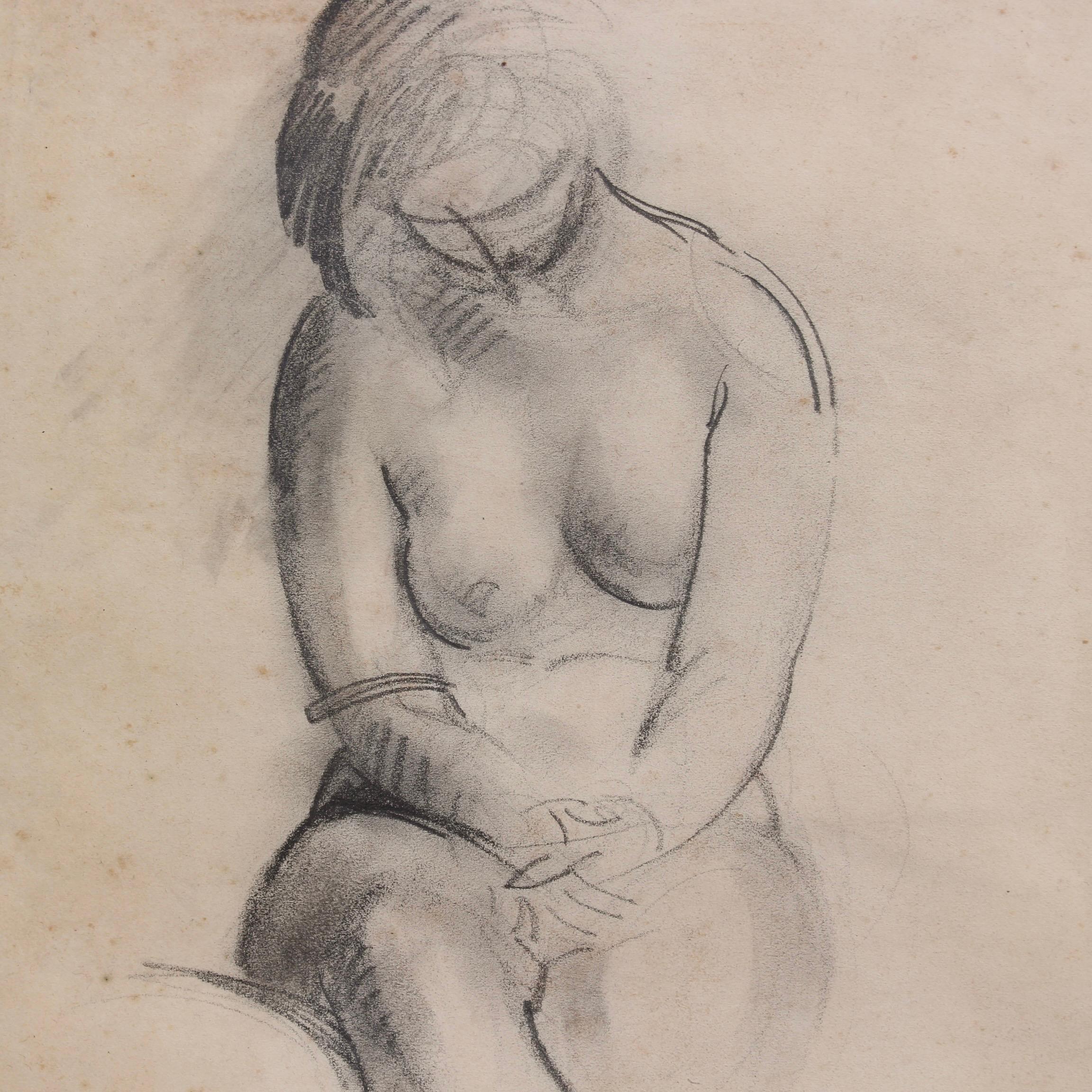 Desnudo sentado