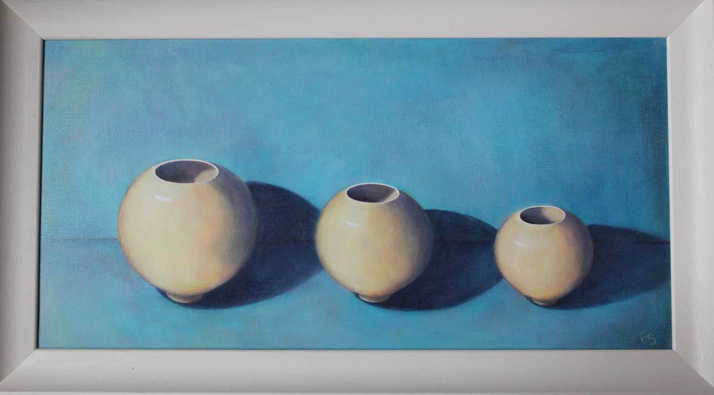 Fiona Smith
“Three in a Row “Still Life
Original Acrylic painting on board.
This painting is sold framed. Framed dimensions 69cm x 38.5 cm x 3.5 cm. The artist Fiona Smith comments  “My background is in teaching and, briefly, millinery, but I had