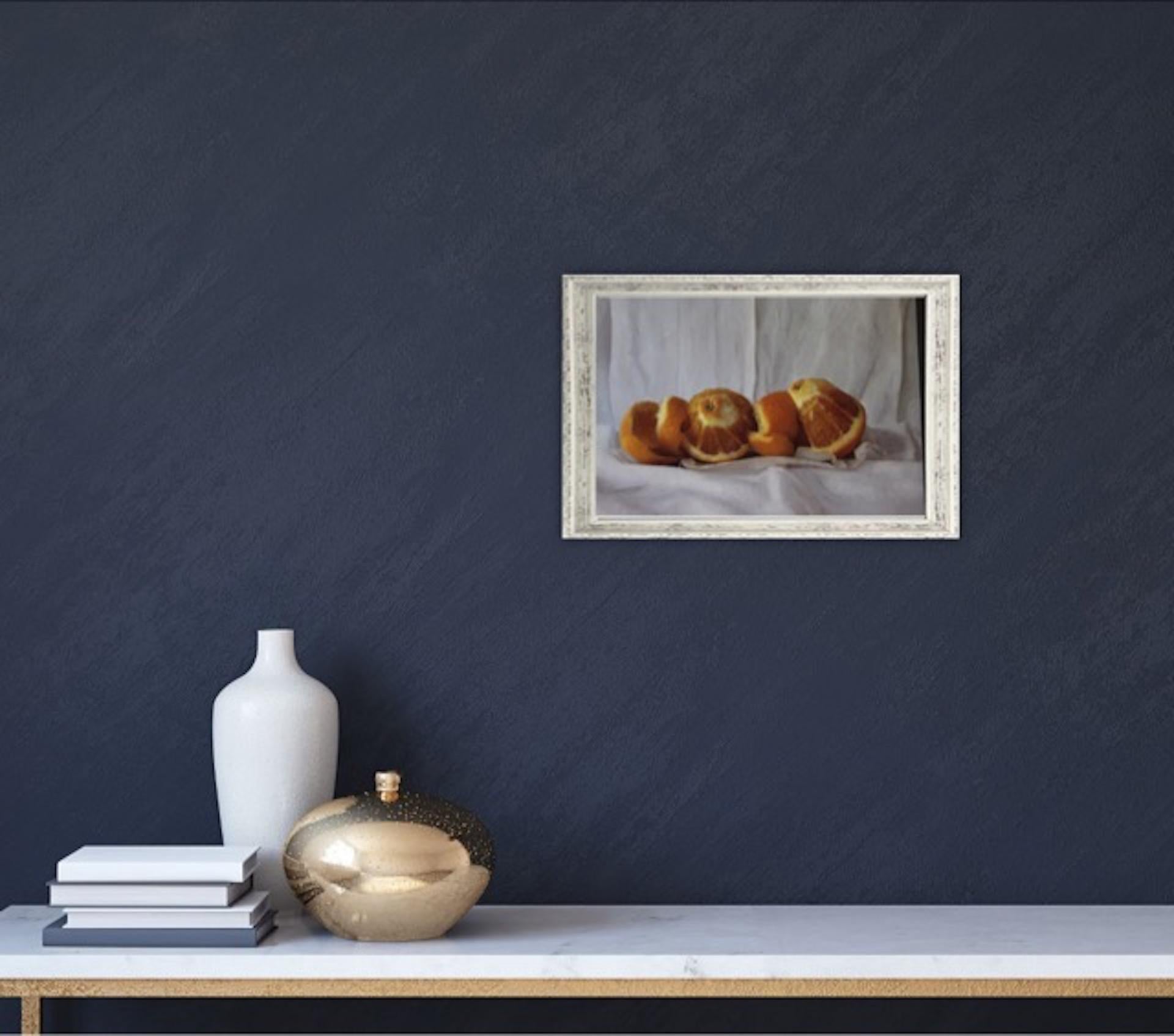Kate Verrion
Two Seville Oranges
Original Still Life Painting
Oil Paint on Board
Image Size: H 15cm x W 20cm x D 2.5cm
Framed Size: H 21.5cm x W 27cm x D 5.5cm
Sold Framed in a Warm Grey Box Frame

Two Seville Oranges is an original oil painting by