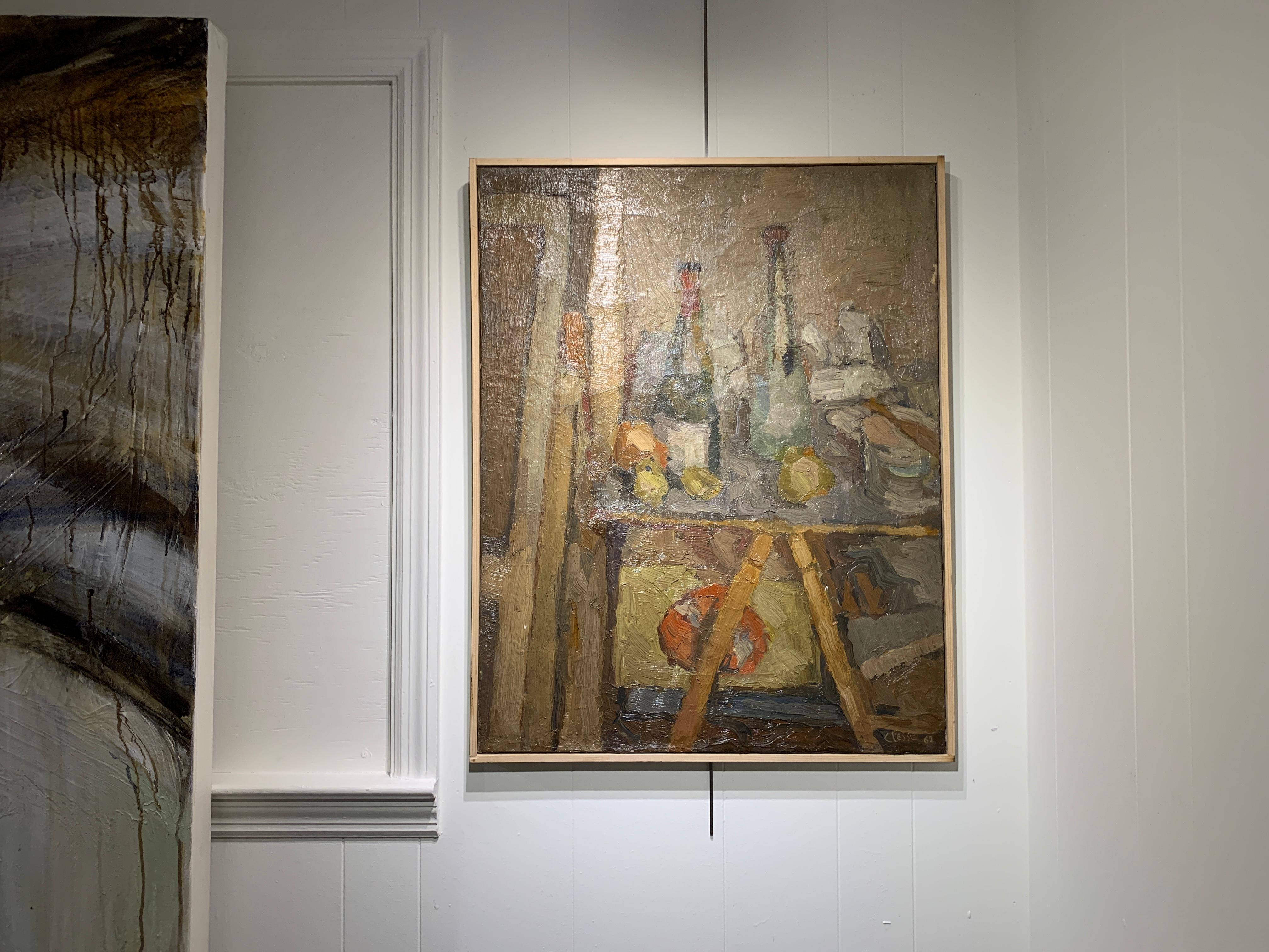 'Nature Morte' is a medium size oil on board painting created by French artist Daniel Clesse in 1962. Featuring a palette made of beige, brown and green tones, the painting is an abstracted representation of a still-life (a 'nature morte' in