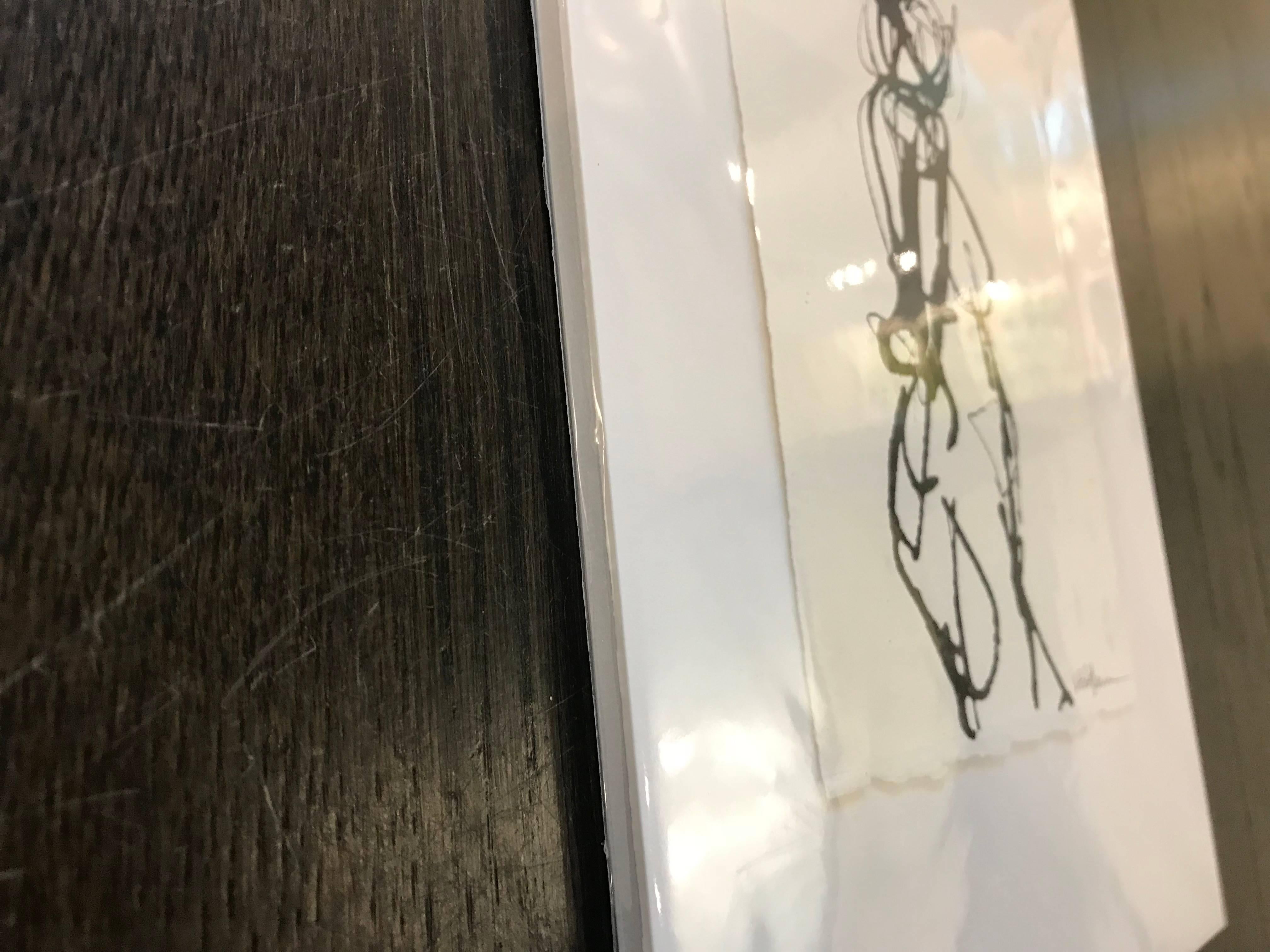 This petite ink on paper drawing depicts the right side profile view of a nude woman.  The artist has signed on the bottom right. The contour line, the application of paint, the techniques by which art is created all inspire and motivate Kelley in
