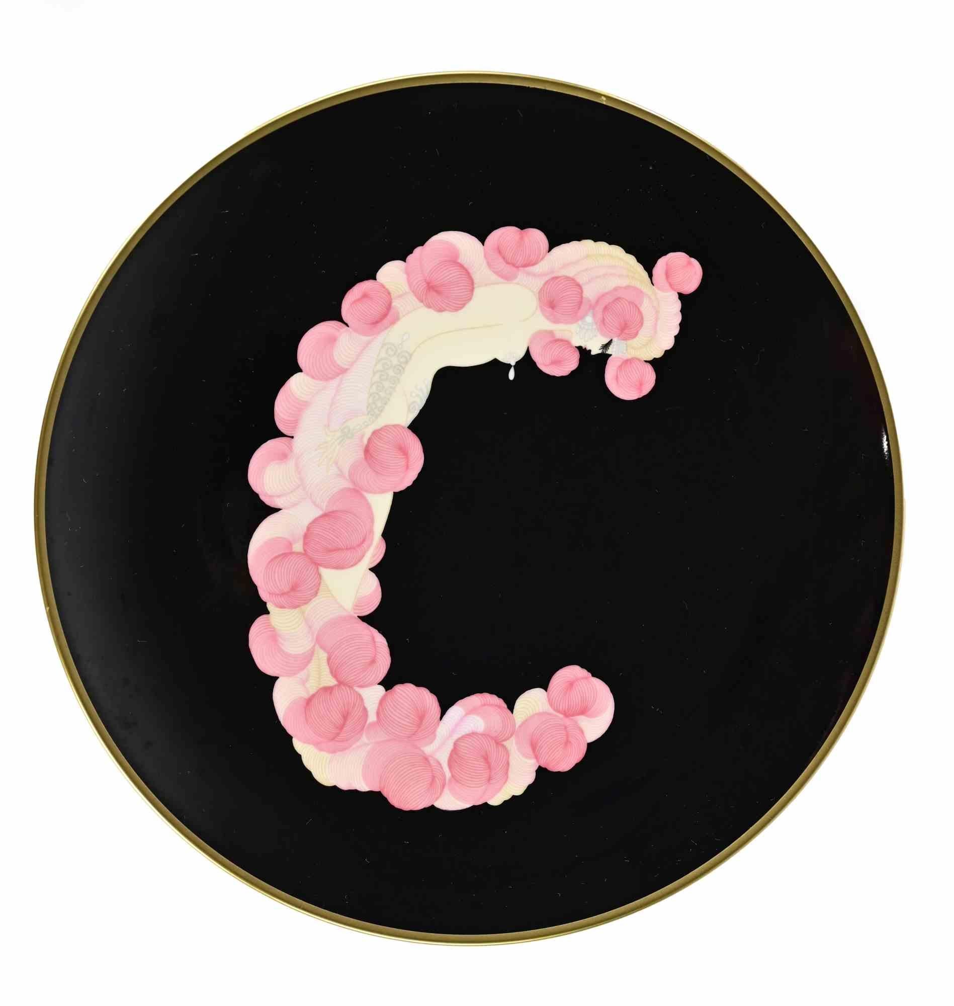 C Plate - The Alphabet is a beautiful color ceramic plate realized after Erté in 1986, as the back of each plate reports.

This plate reproduces the original painting representing the letter c by Erté (Romain de Tirtoff) from the series "The