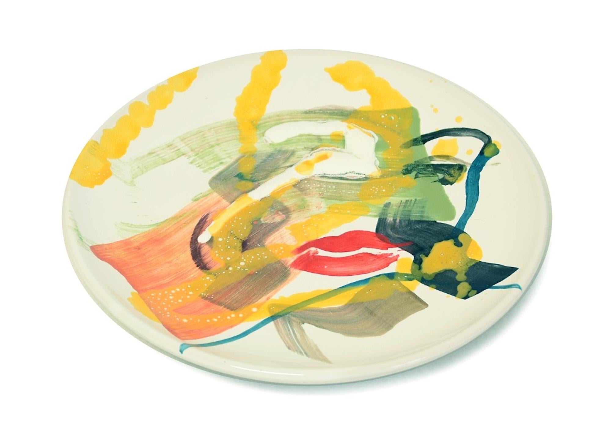A Kiss of Autumn is a hand-made flat ceramic dish realized by the Russian emerging artist, Anastasia Kurakina in 2019. 

This is a  beautiful ceramic dish representing two red, sensual and full lips on an abstract foreground with colors of the