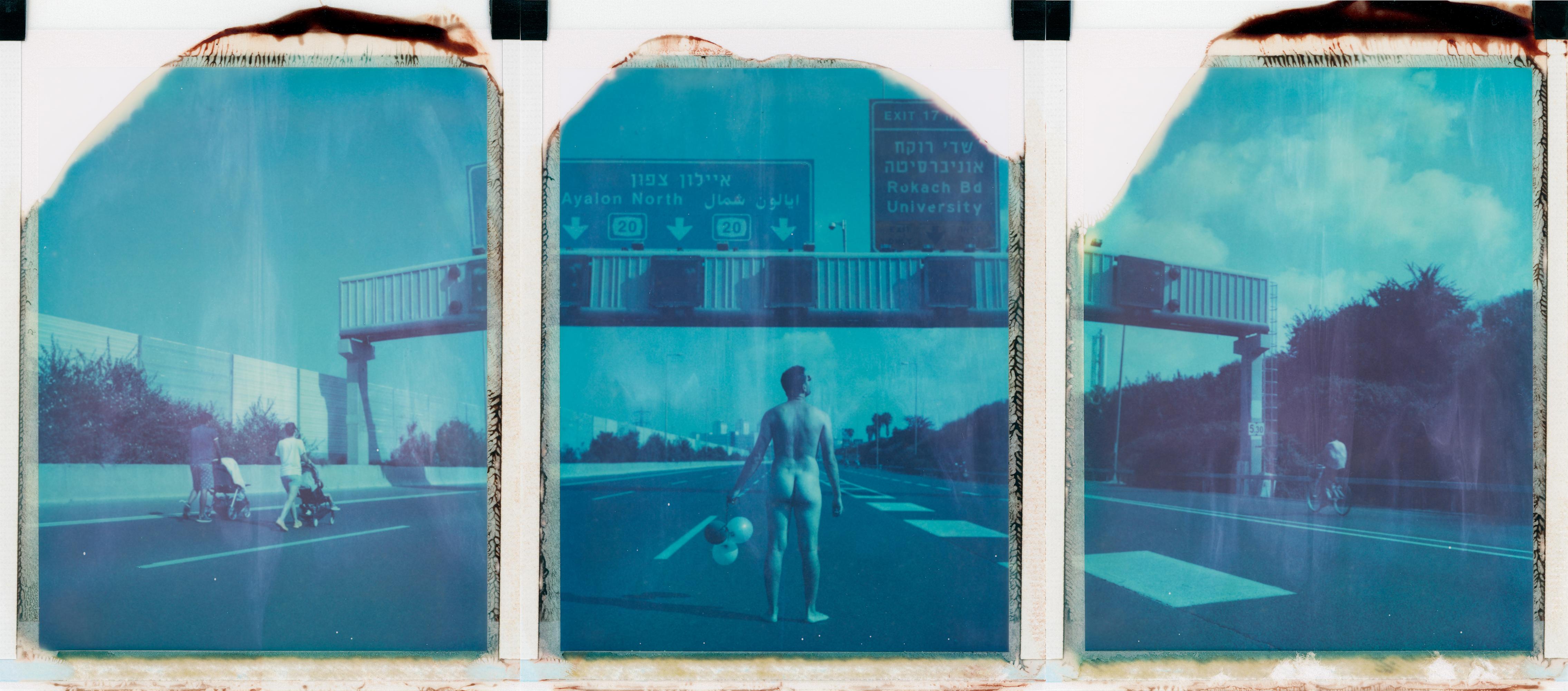 Ariel Shelleg Color Photograph - Wanderlust (Self Portrait), 21st Century, Contemporary, Polaroid, Blue, Highway