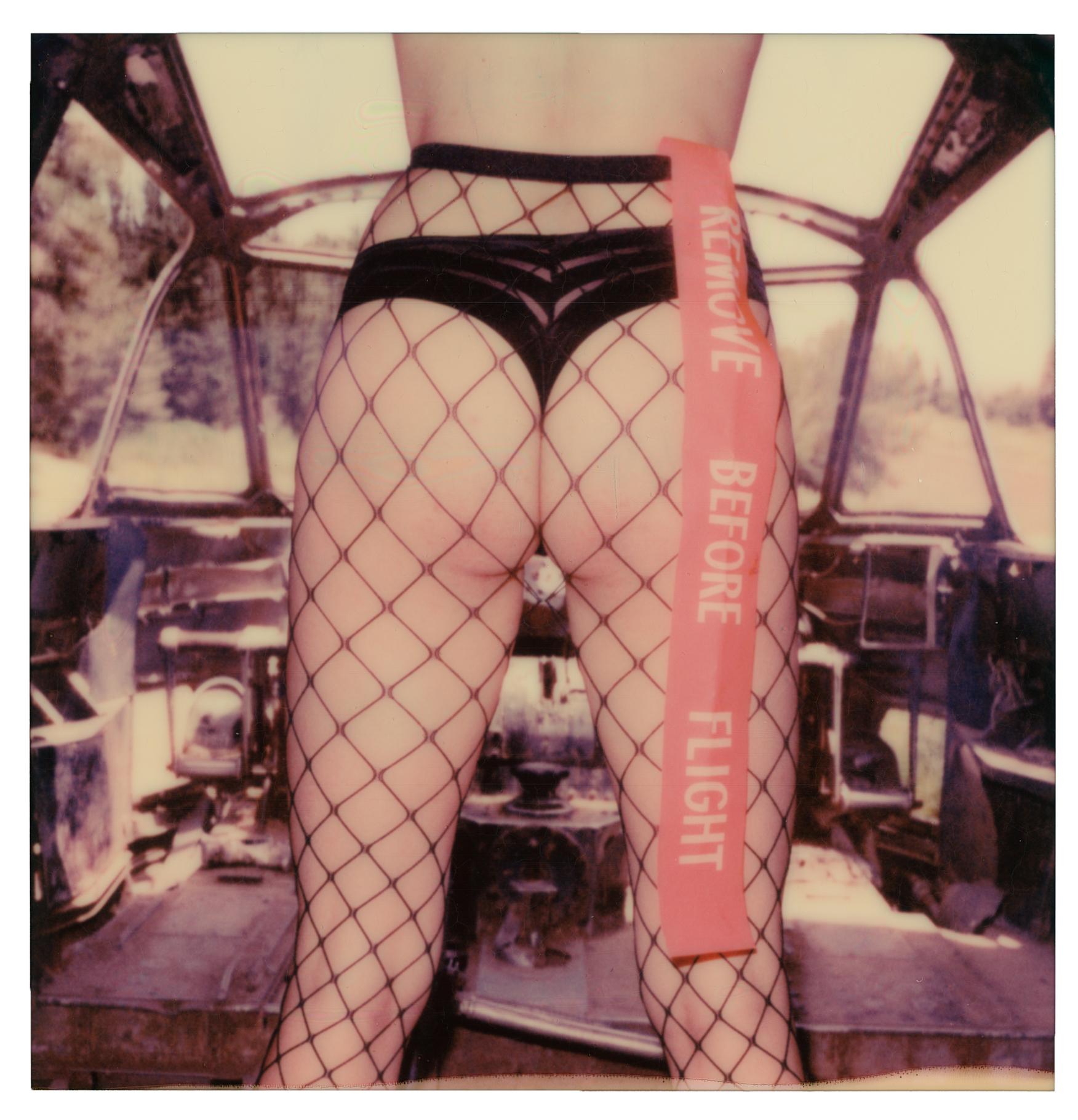 Ariel Shelleg Color Photograph - Remove Before Flight - 21st Century, Contemporary, Polaroid, Nude