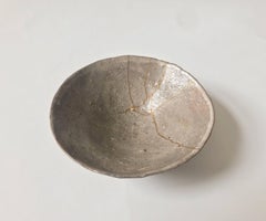Grey ceramic bowl by Shiro Shimizu with gold kintsugi