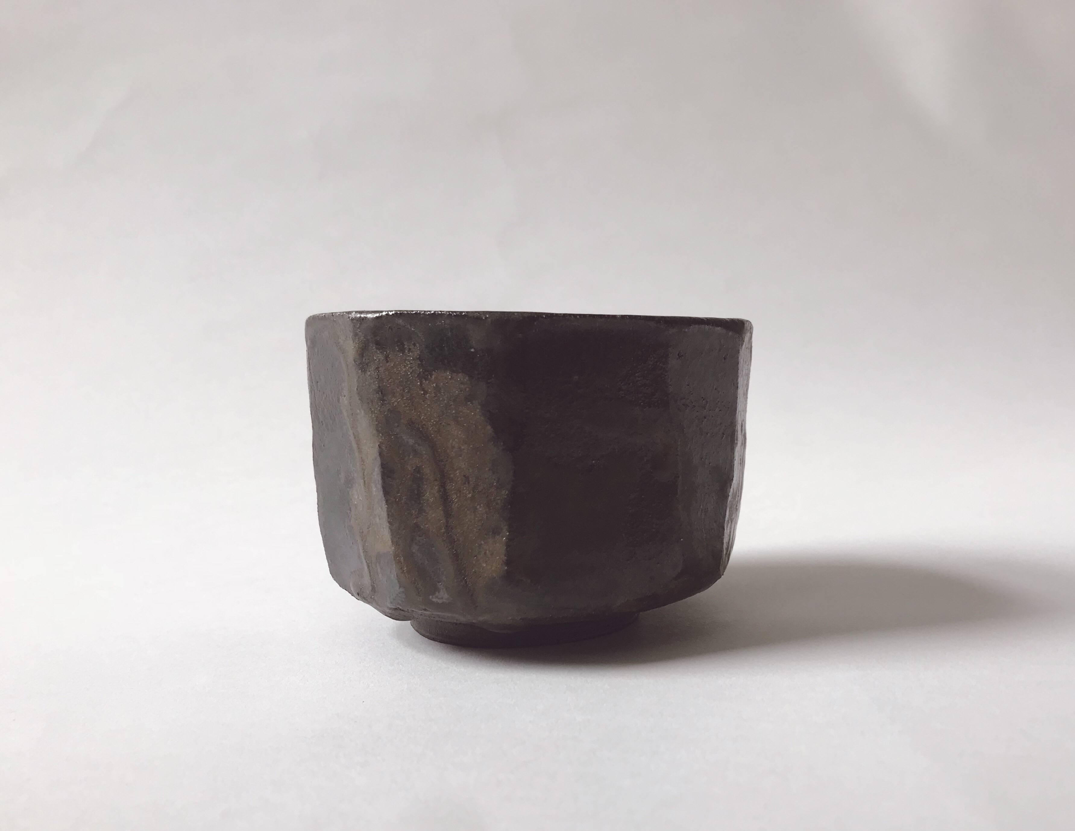 A tea cup with a dark, iridescent glaze by New York-based British artist Romy Northover in the Japanese-inspired style that has won her many admirers on both sides of the Atlantic. Shown in our Tea Ceremony exhibition which opened in May