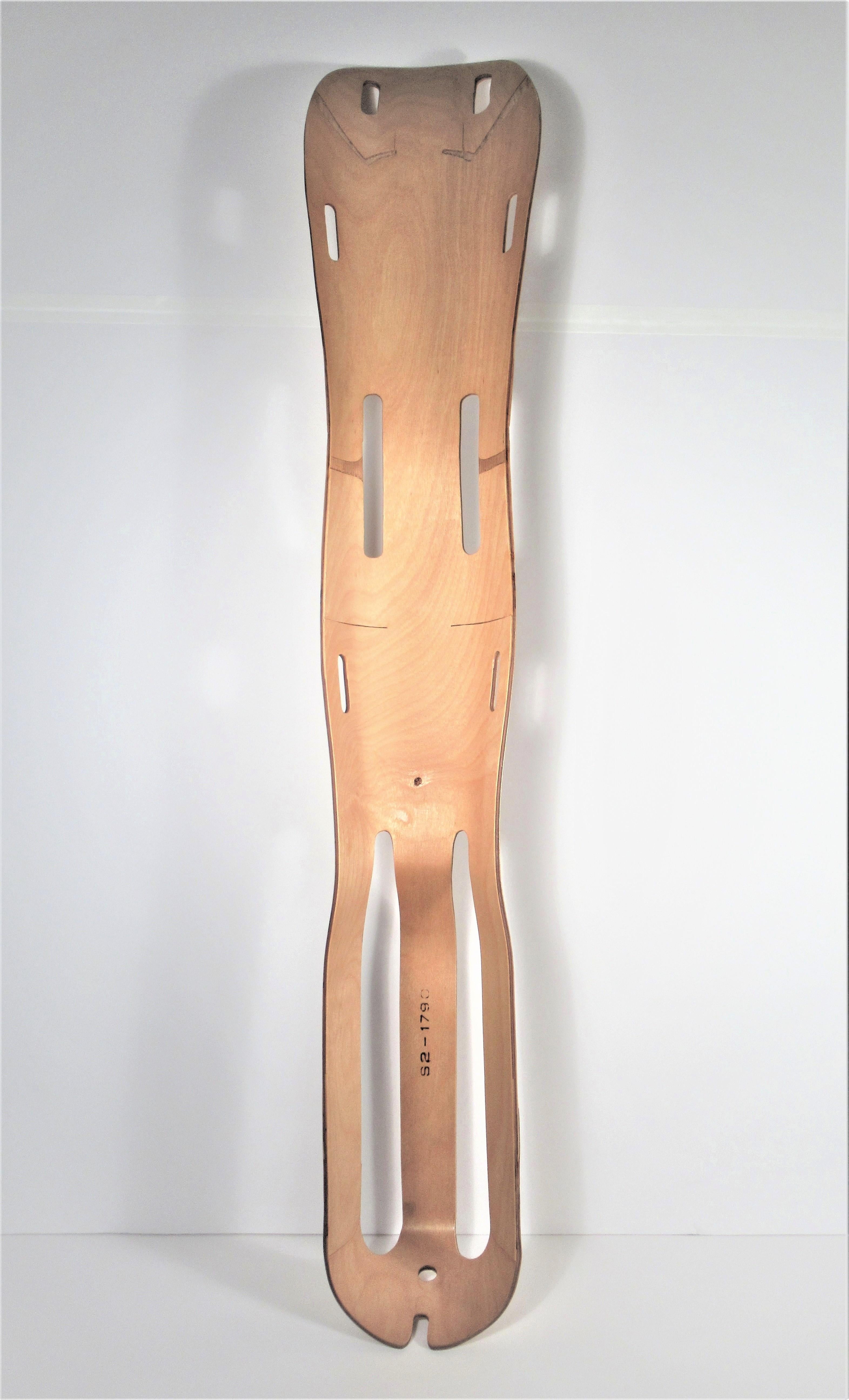 Molded birch plywood leg splint by Charles and Ray Eames 1