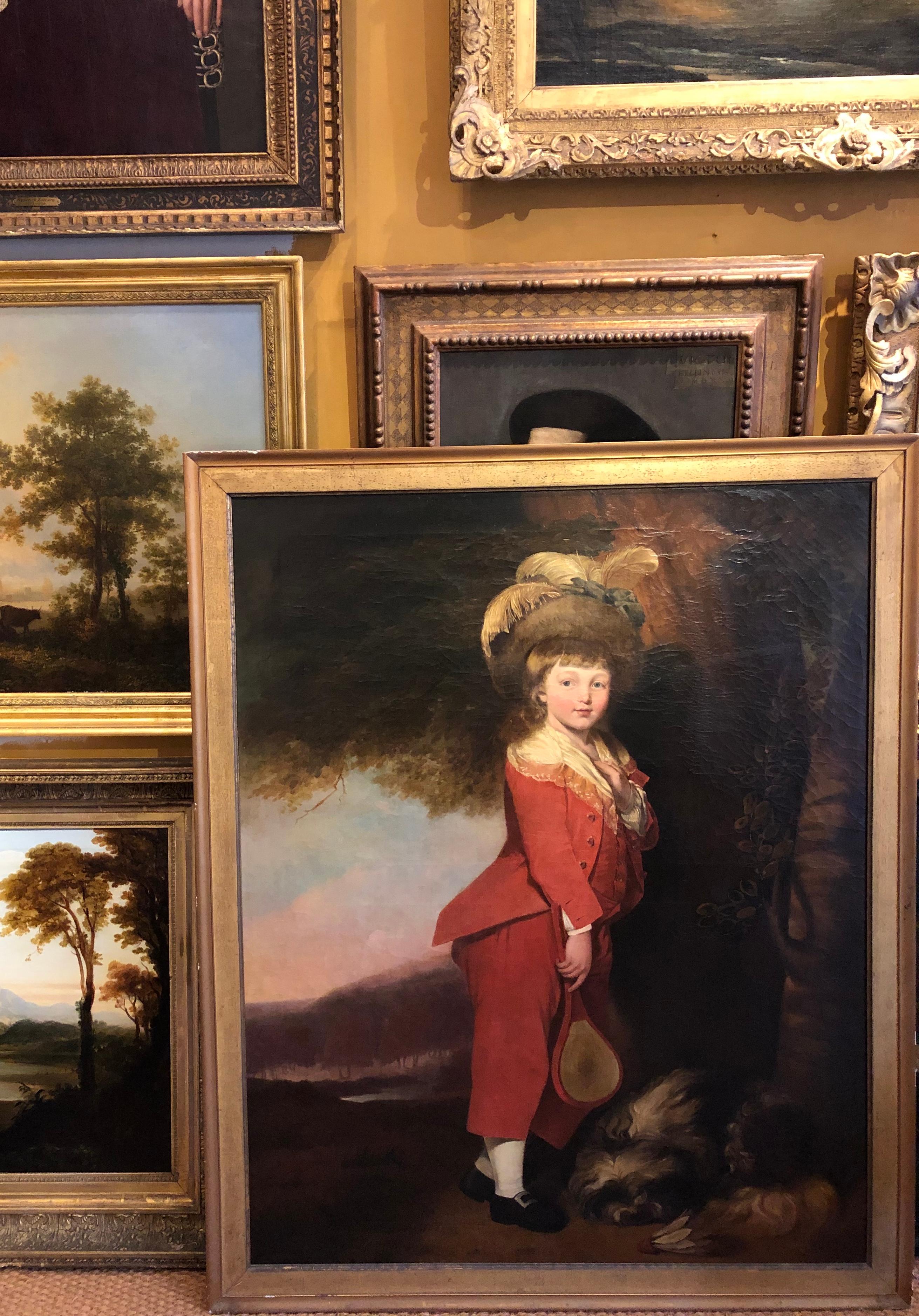English School, early to mid-19th century
Full-length Portrait of a Boy in Red, holding a badminton racquet beneath a tree, a dog asleep at his feet with a shuttlecock 
oil on canvas
in plain gilt frame
49 1/2 x 39 1/4 inches, unframed
55 x 45