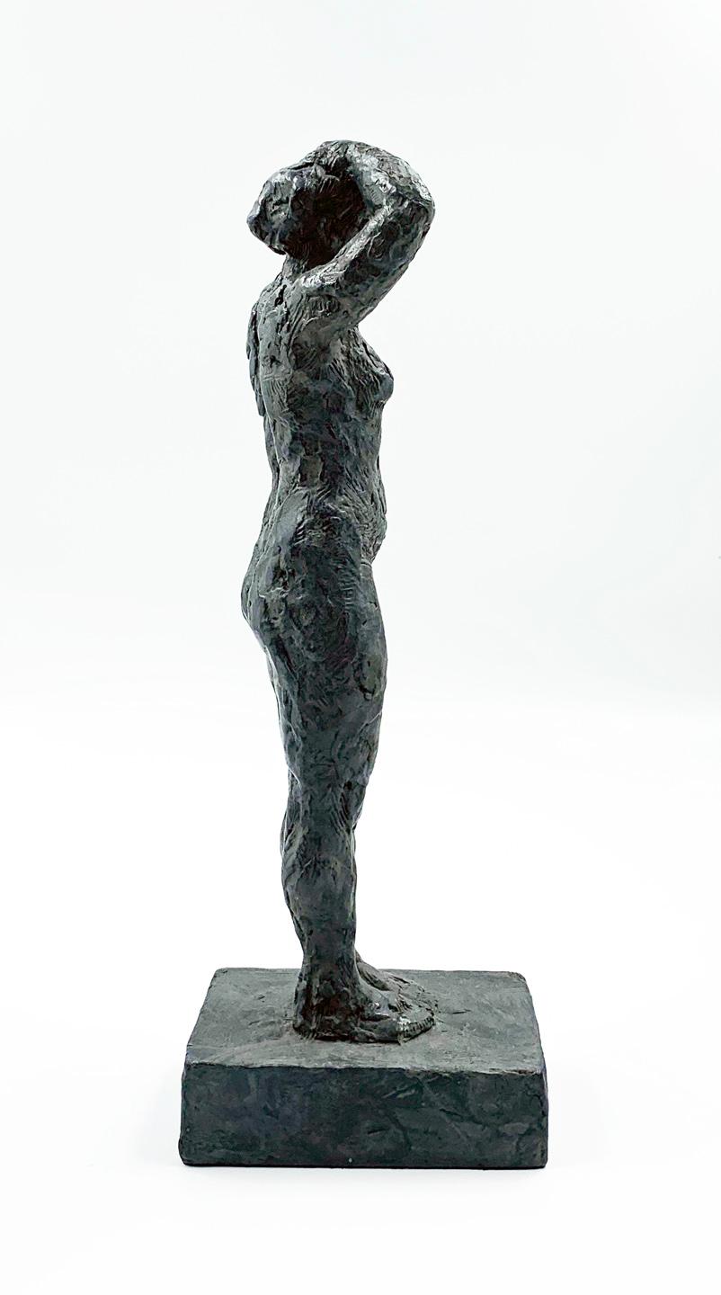 She Turns to Face the Sun - contemporary figurative bronze sculpture