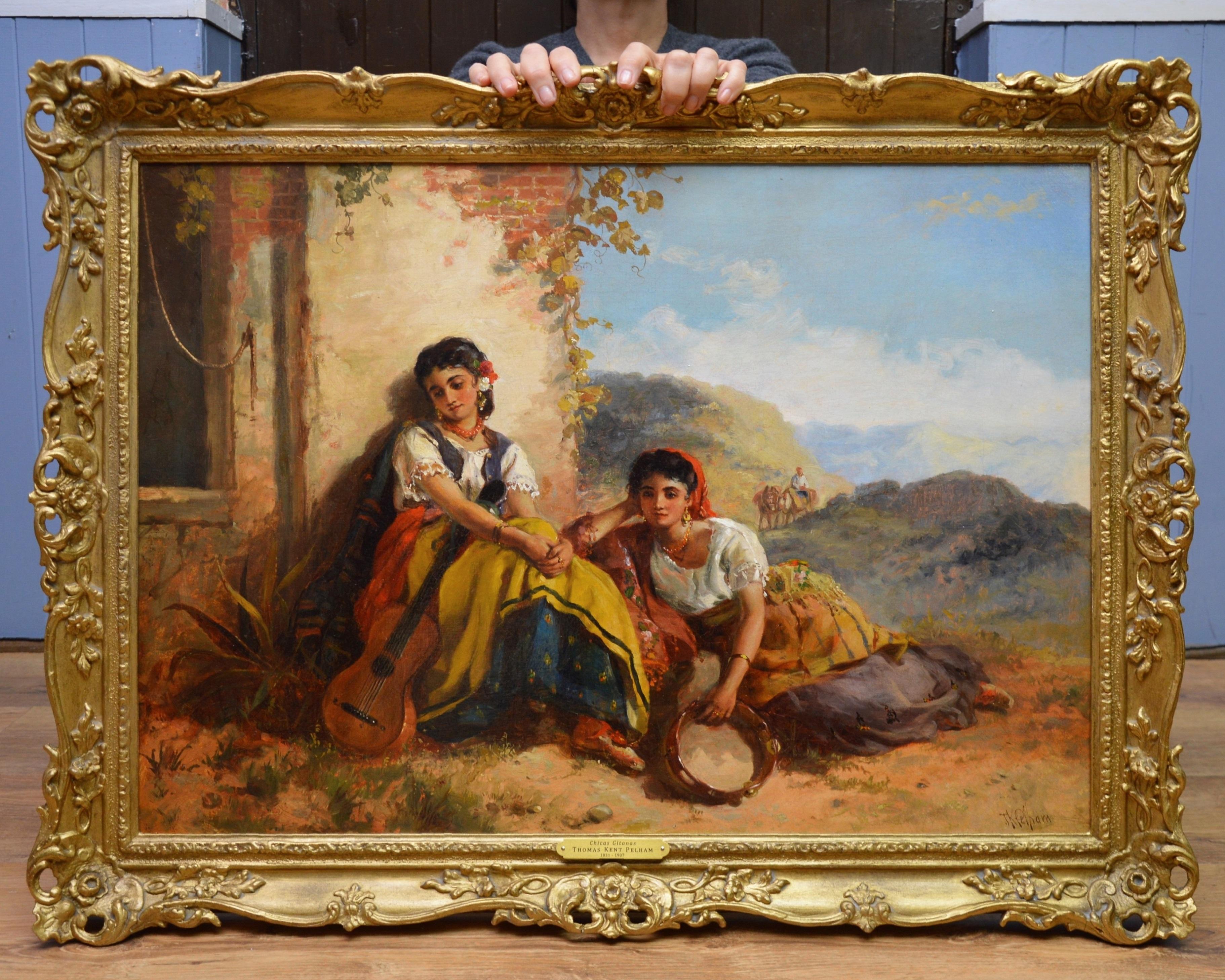 This is a large fine 19th century oil on canvas depicting a pair of young Spanish girls with a guitar and tambourine resting in the shade by the eminent Royal Academy painter Thomas Kent Pelham (1831-1907). ‘Chicas Gitanas’ is signed by the artist