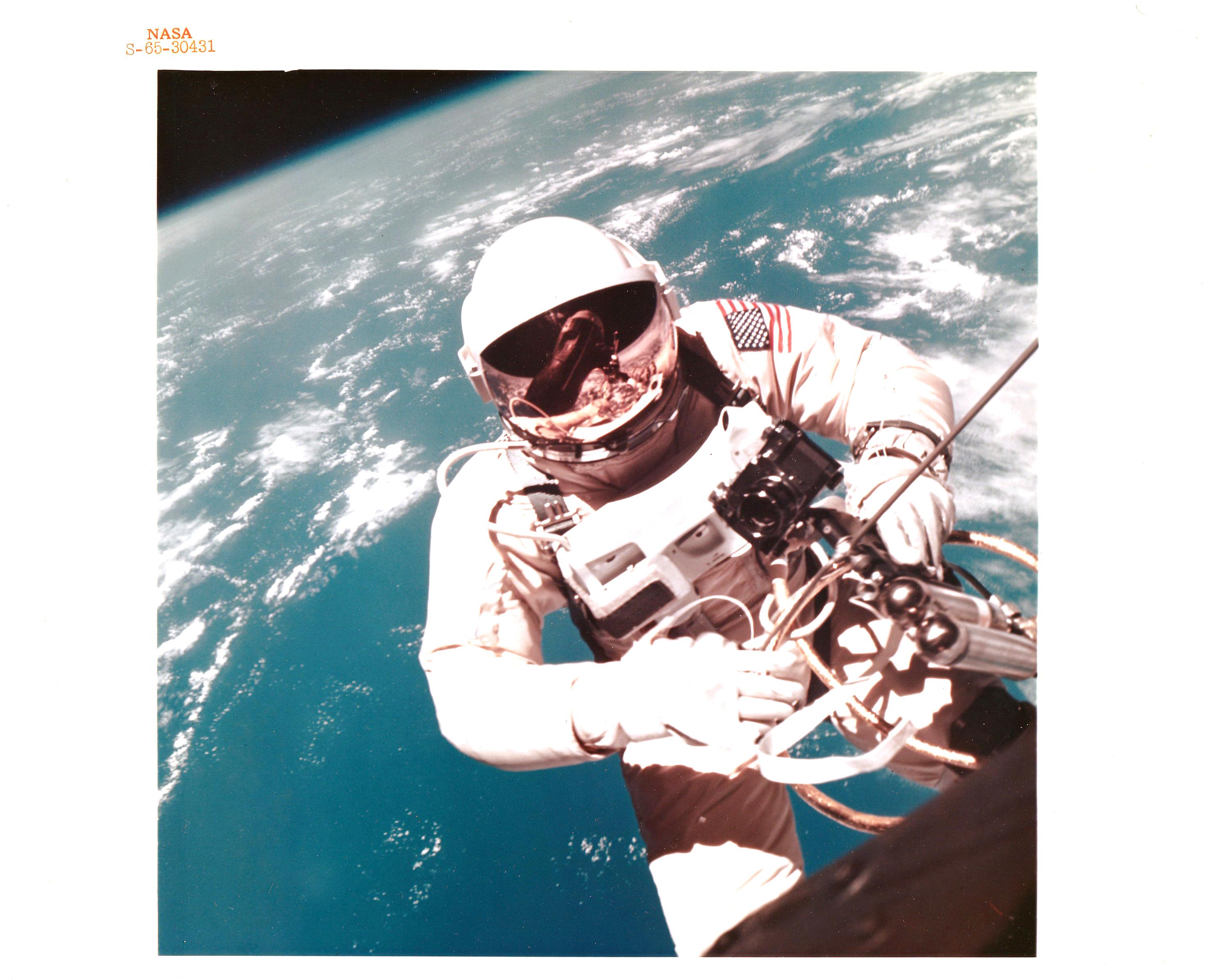 NASA Color Photograph - Historic First Photograph of Man in Space: Ed White spacewalking over Hawaii