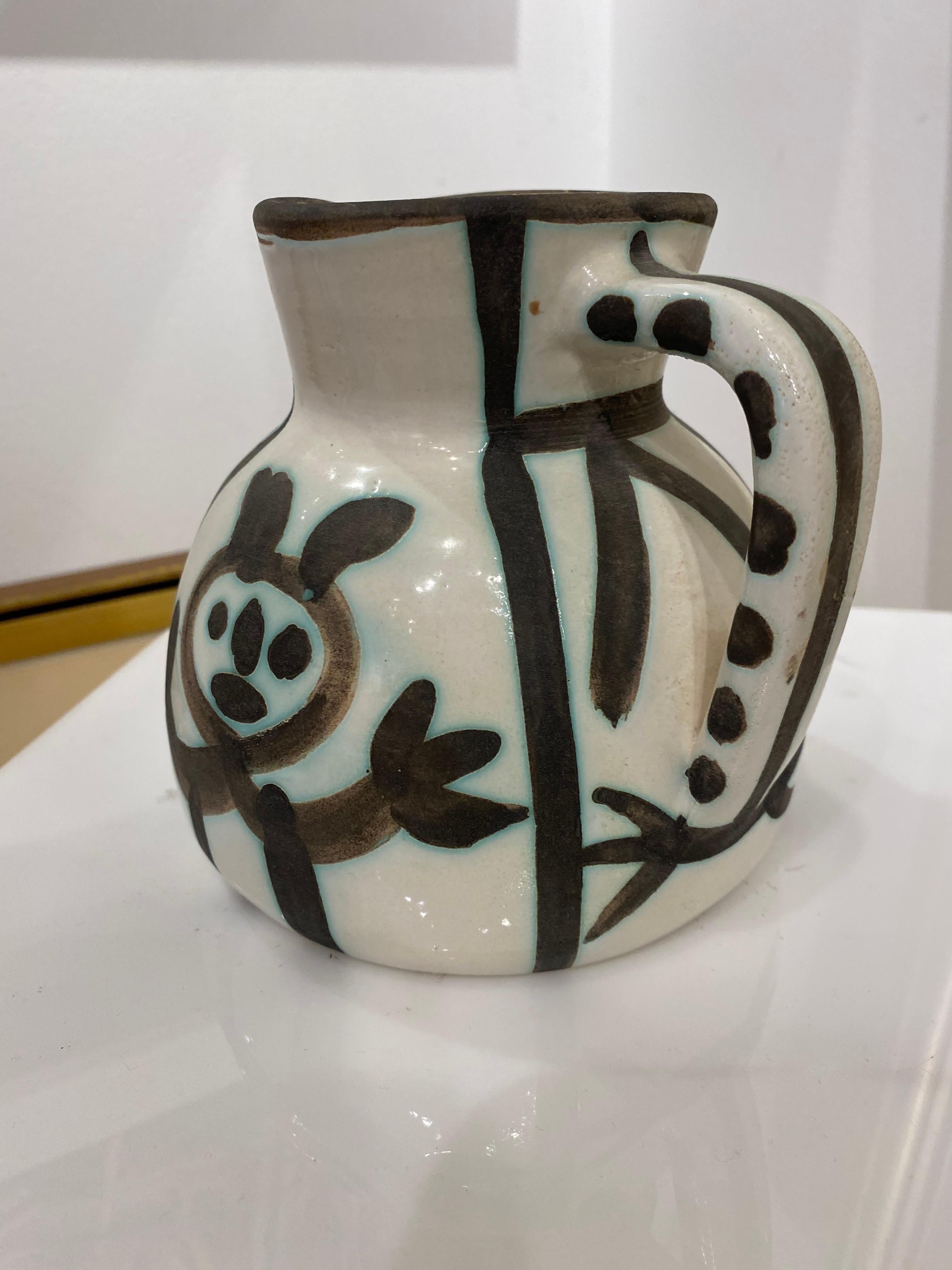 Turned Pitcher
Edition of 300
A.R. White Earthenware Clay, Oxidized Paraffin Decoration, White Enamel, Black
5.12 x 5.71  inches