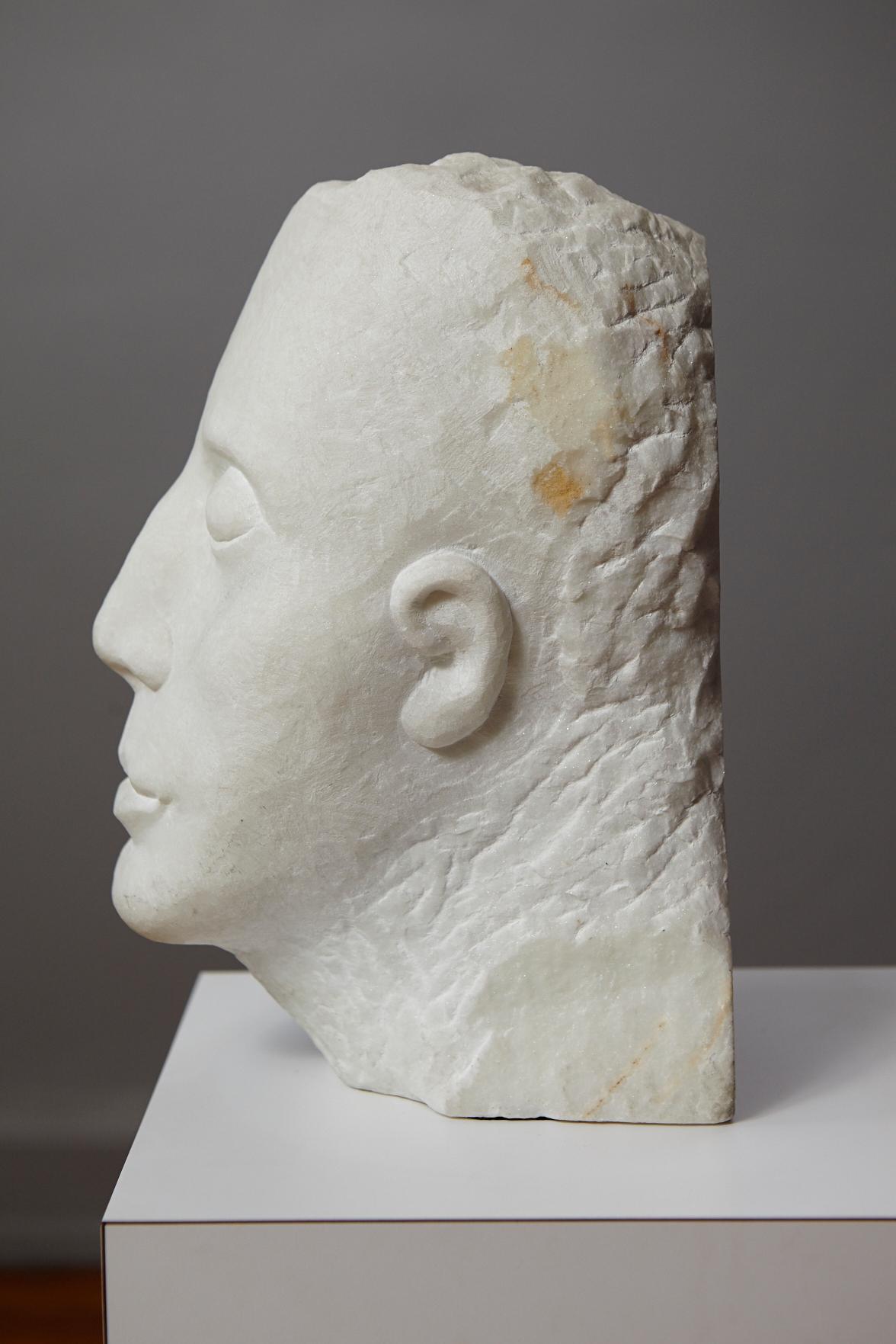 Dolores Singer, American (1936)
Head III
White Carrara marble relief sculpture, unpolished finish

A modern 20th century interpretation as an homage to the classic Greek sculptures.

Dolores Singer has used White Carrara marble in an unpolished