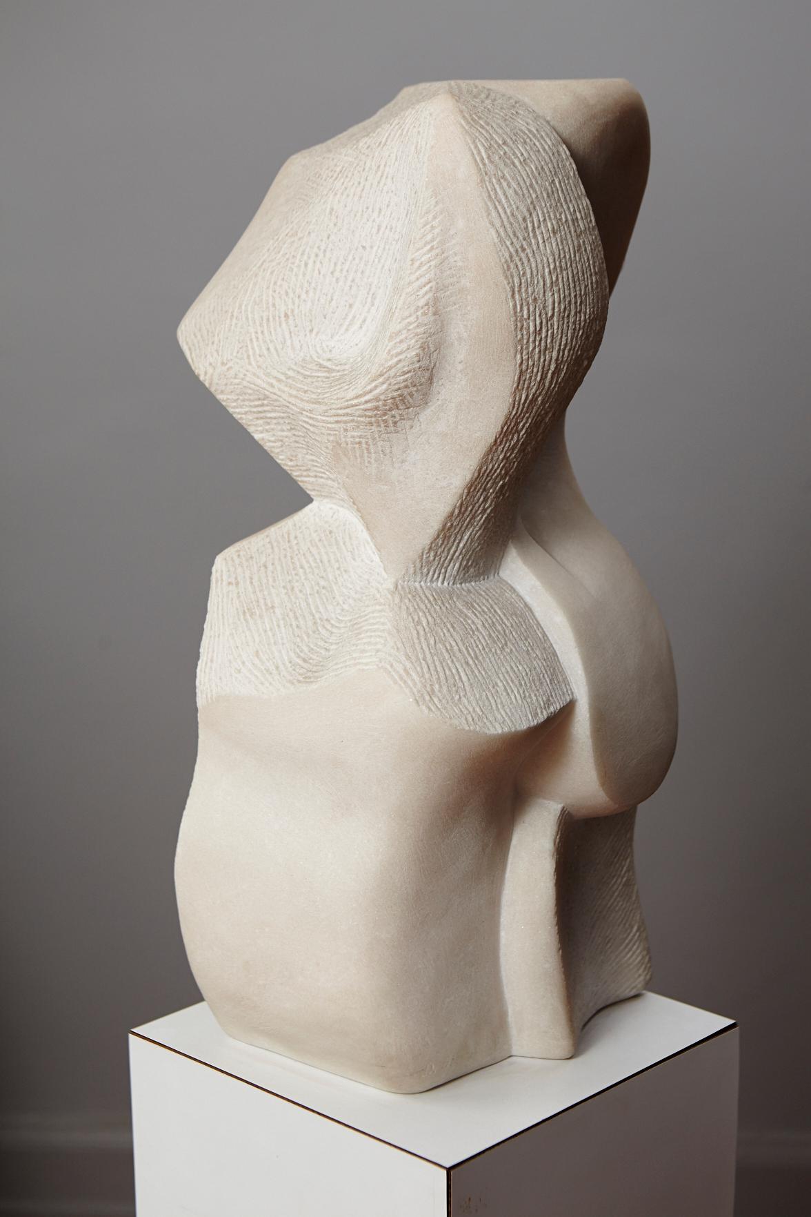 Dolores Singer, American (1936)
Artemis
Signed D. S. '90
Portugues pink marble marble sculpture, unpolished finish

A modern 20th century interpretation as an homage to the classic Greek sculptures.

Dolores Singer has used white Carrara marble in