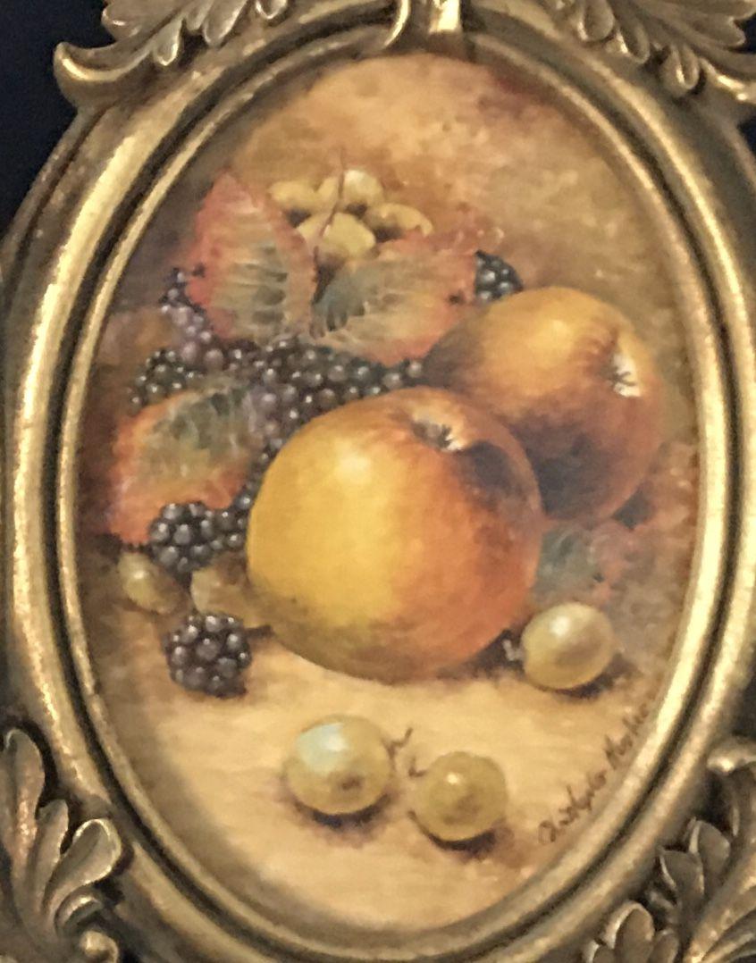 Pair of exquisitely framed and glazed watercolours of Worcestershire fruit by the former Royal Worcester artist, Christopher Hughes.  Painted specifically to fit this unique joined pair of ornate metal gilt freestanding frames . 8 in x 7 in.