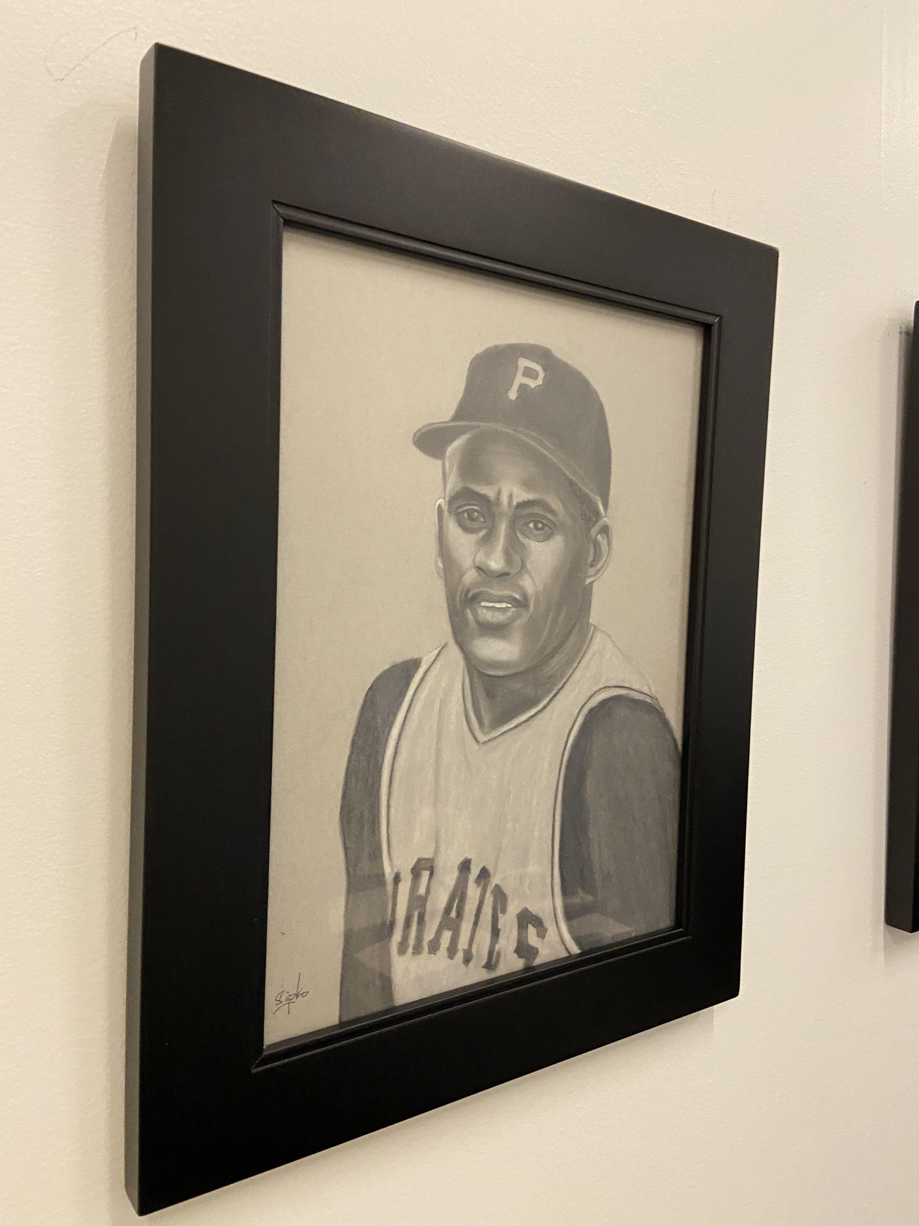 This is a portrait of Roberto Clemente.  Along with being one of the greatest to ever play the game, he was also a great humanatarian.  He used his place in baseball to serve others.  This piece will look great hanging in your sport memorabilia