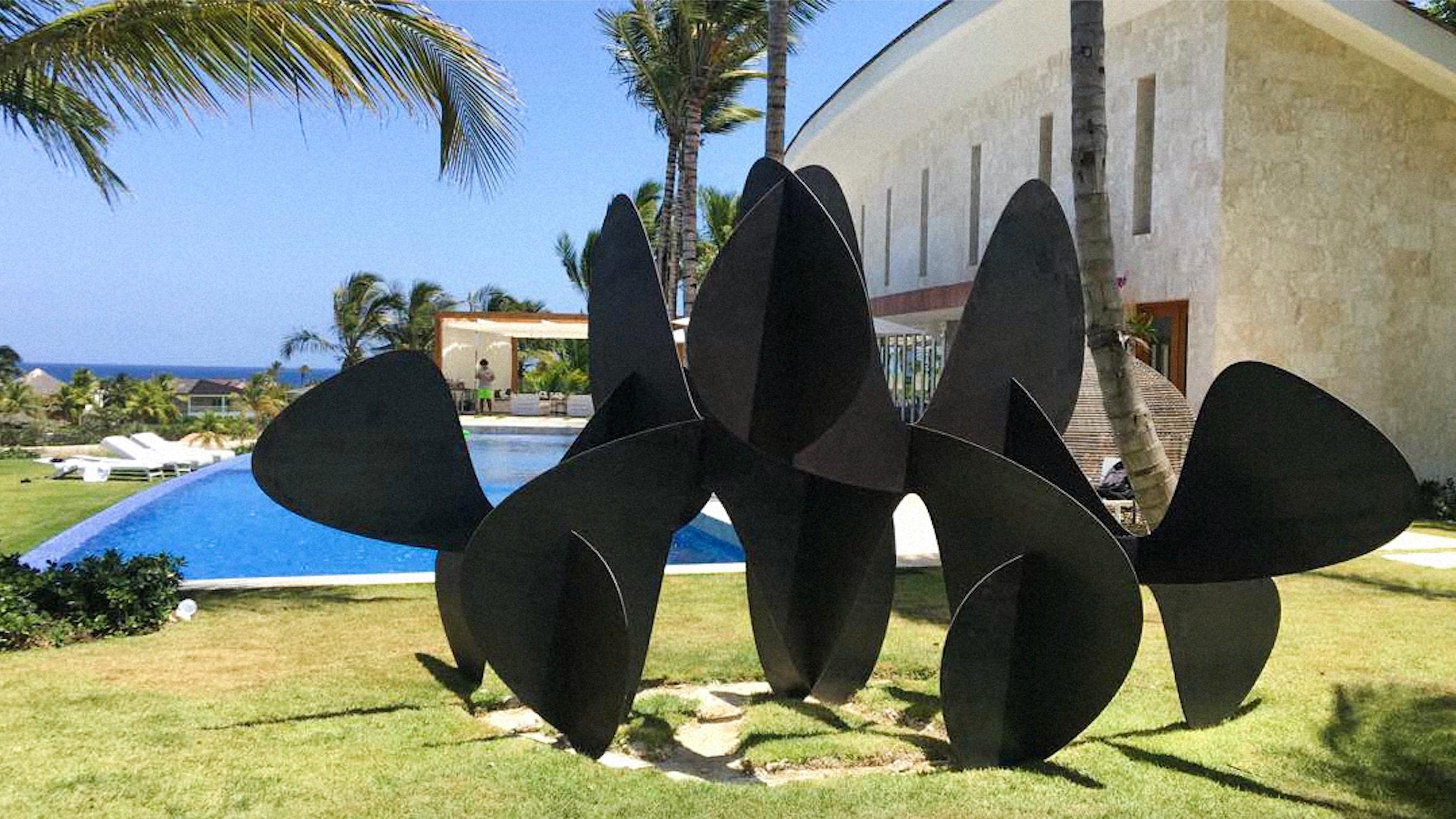 Barricada #2 ac L, sculpture by contemporary Venezuelan artist Alejandro Vega Beuvrin. 
Stainless steel (painted or not) or weathering steel, 235 cm × 400 cm × 155 cm. Edition of 5 + 3 A.P.
The pictures show two different versions of Barricada #2 ac