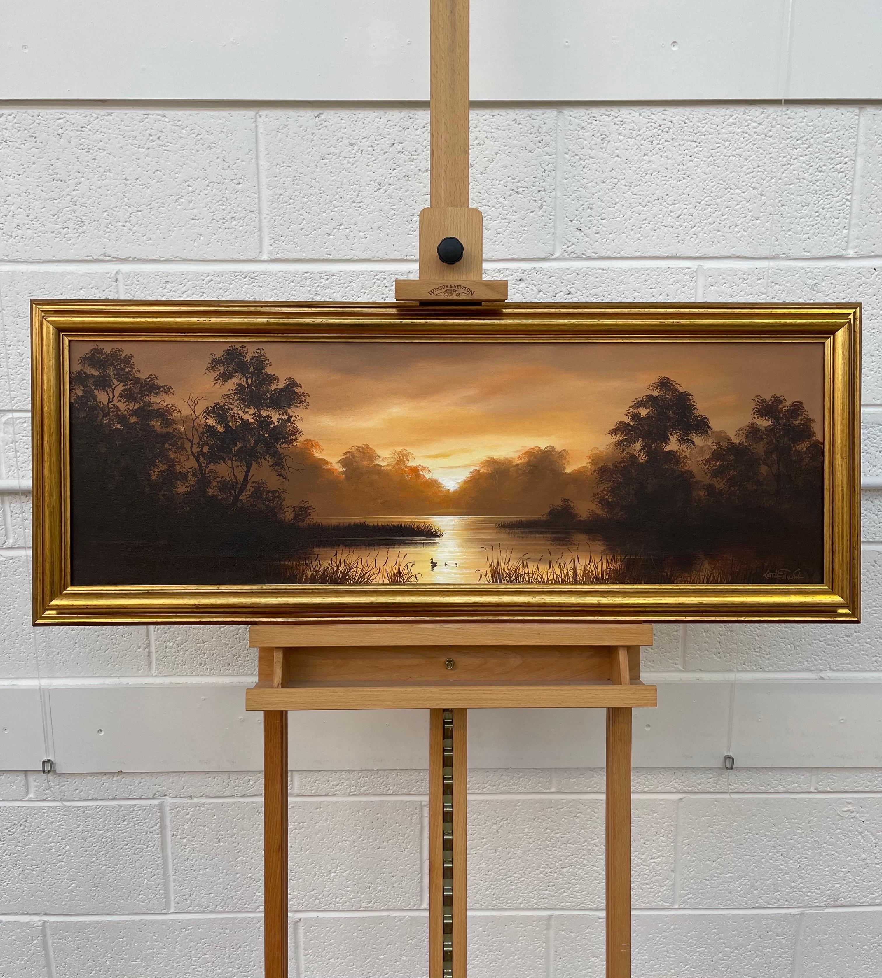 Oil Painting of River Sunset Landscape in Warm Brown Colours by British Artist Keith English (1935-2016)

Art measures 38 x 14 inches
Frame measures 40 x 16 inches

Oil on Canvas. Signed lower right. Framed in a gold moulding. 
Keith English