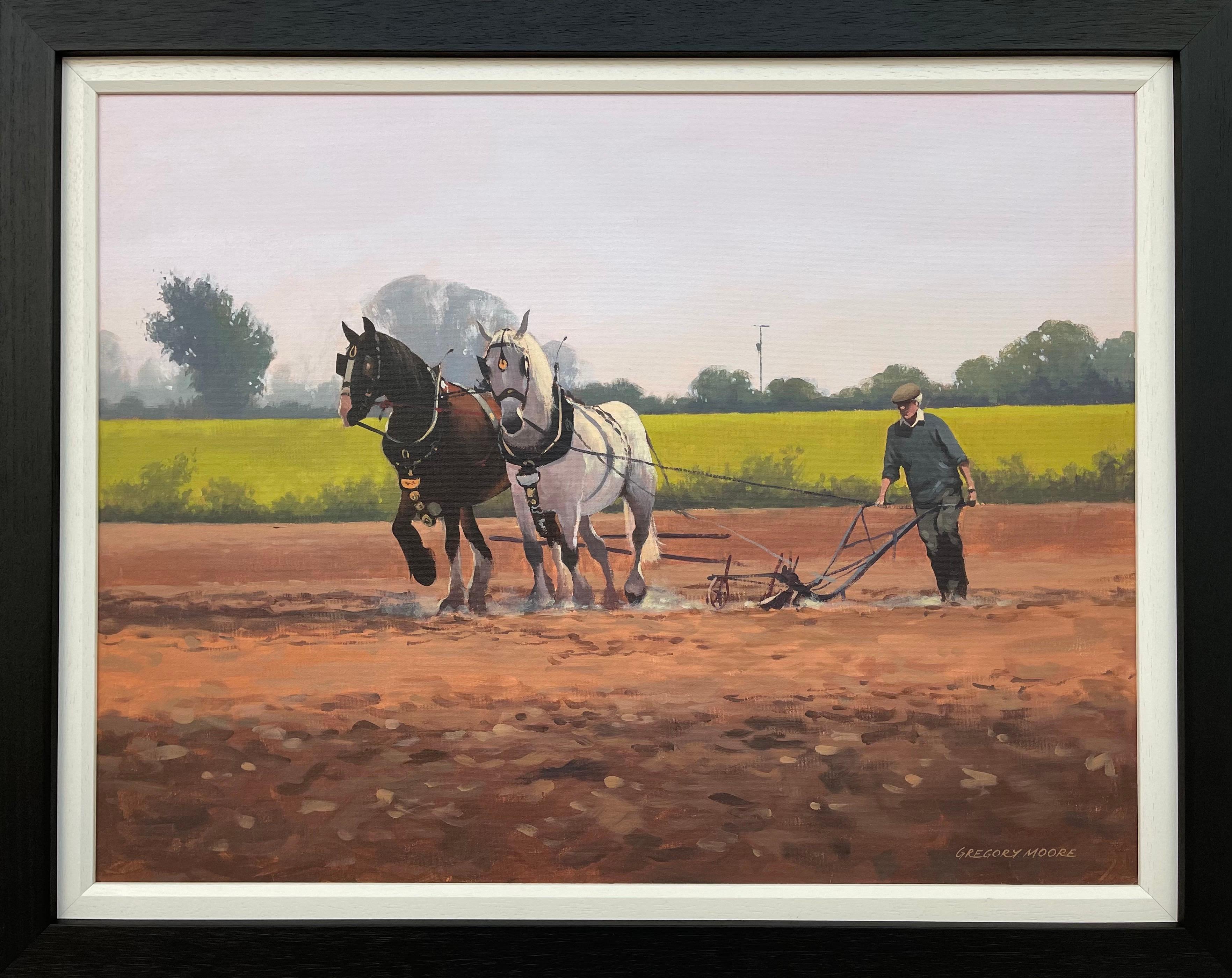 Caballos con granjero y arado en el campo de Irlanda por un artista irlandés contemporáneo