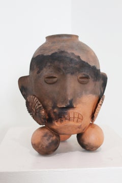 "Tripod Head Vessel 3" terracotta sculpture, sitting head by John Donovan