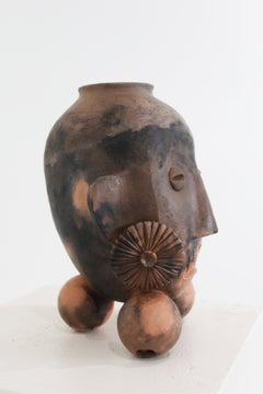 "Tripod Head Vessel 3" terracotta sculpture, sitting head by John Donovan