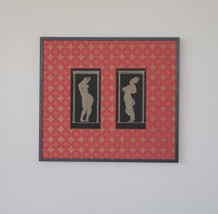 "Equinox" - gold block print on black paper with red pattern mat