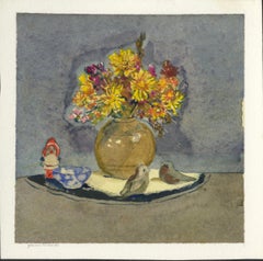 Multi Colored Flowers in Vase Surrounded by Birds and Gnome
