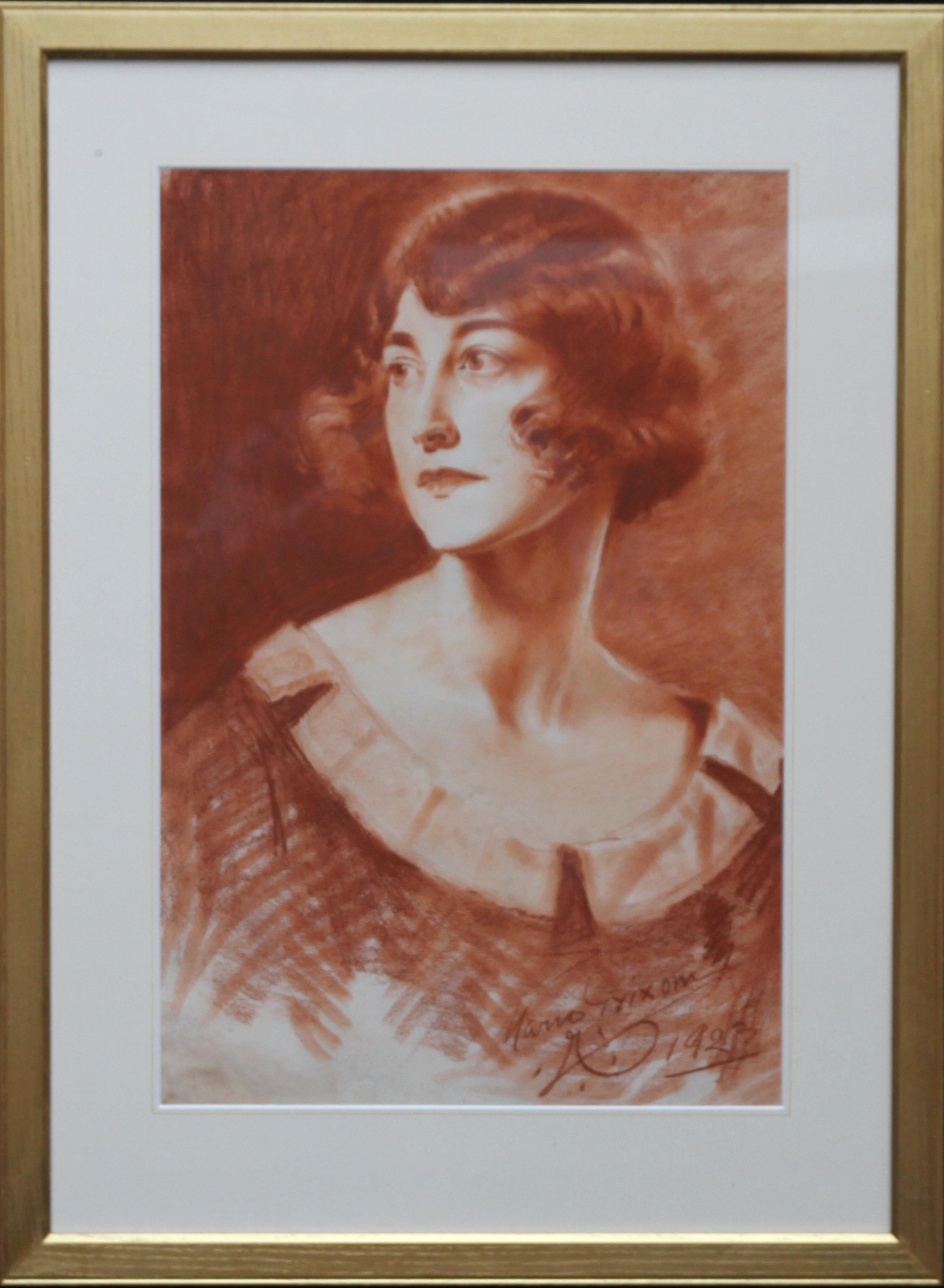 This is a very pretty sanguine chalk drawing on paper of a young woman dated 1923 by Count Mario Grixoni.  Executed by one of the leading artists of the day it is a very striking and fascinating portrait in an Art Deco style with beautiful delicate