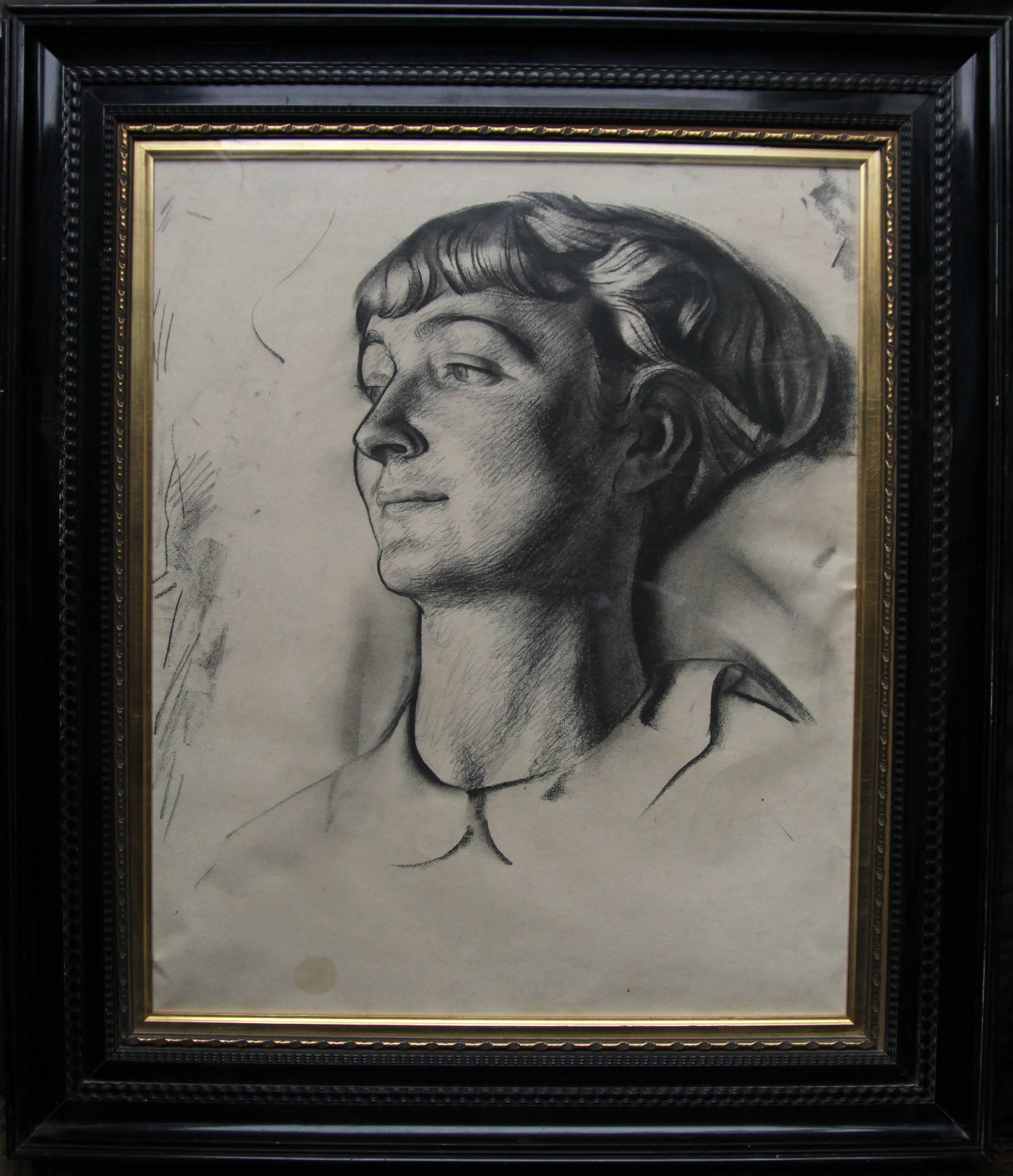 A fine large charcoal and pencil drawing by British listed artist James Stroudley. Executed in 1931, it is a stunning example of a 1930s Art Deco portrait. Very strong and bold, it depicts a portrait of a young woman. It is very evocative and is in
