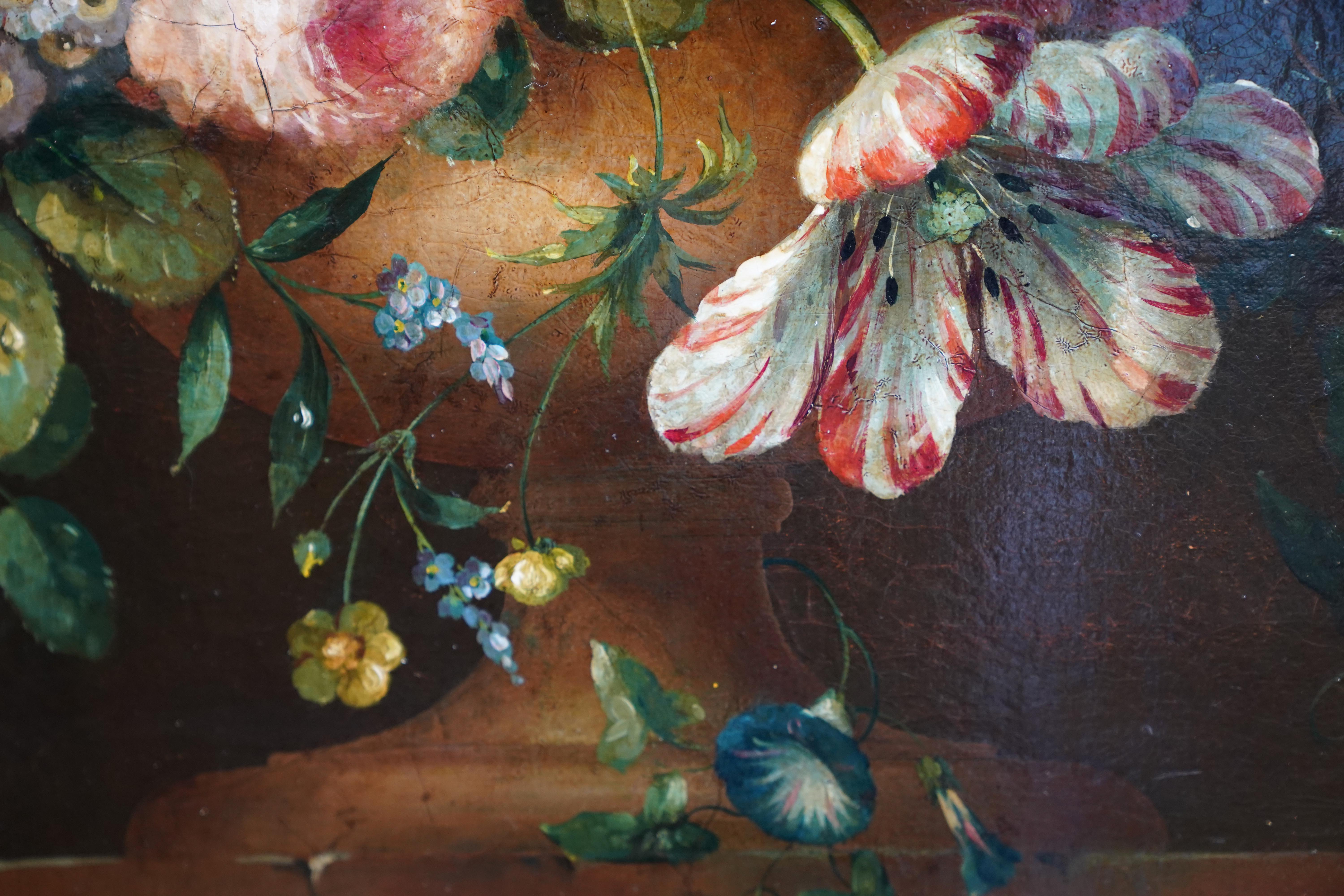 This lovely Dutch 18th century floral still life oil painting is attributed to the circle of Verbruggen. This beautiful arrangement is bejewelled with superb dew drops and the magnificent apricot hollyhock disappear into the darkness contrasting