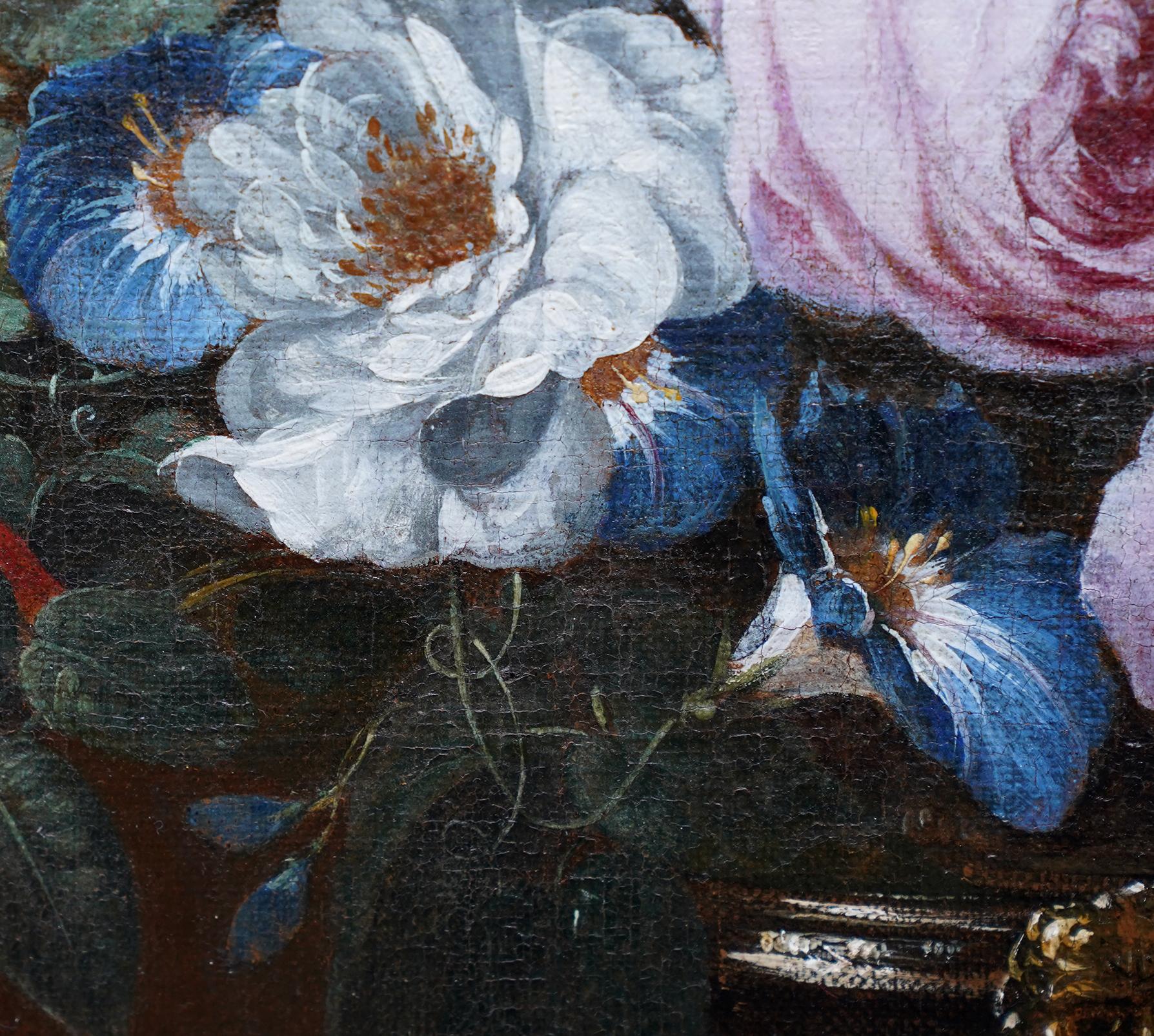 This stunning Golden Age Baroque floral still life oil painting is attributed to a follower of Jan Van Huysum. It is actually part of a pair of paintings in beautiful matching fames and with excellent provenance, a previous owner being Rothchild.