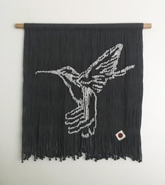 Magnifique oiseau coquillage suspendu fabriqué avec des cordes et des épingles