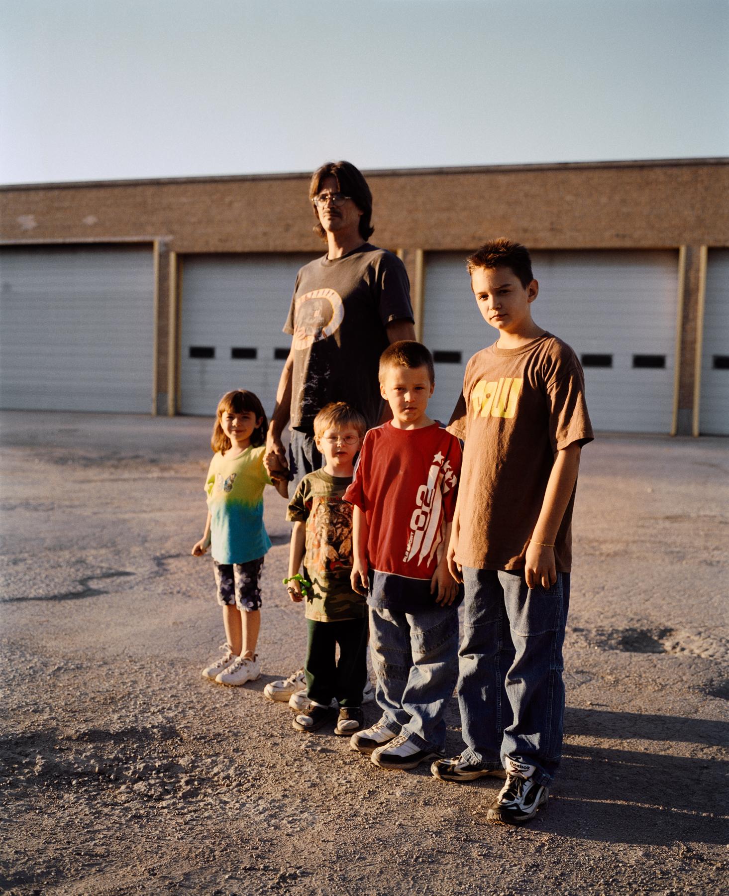 Gregory Halpern Color Photograph - Omaha Sketchbook: Patrick with his Kids, Omaha, NE - Contemporary Photography