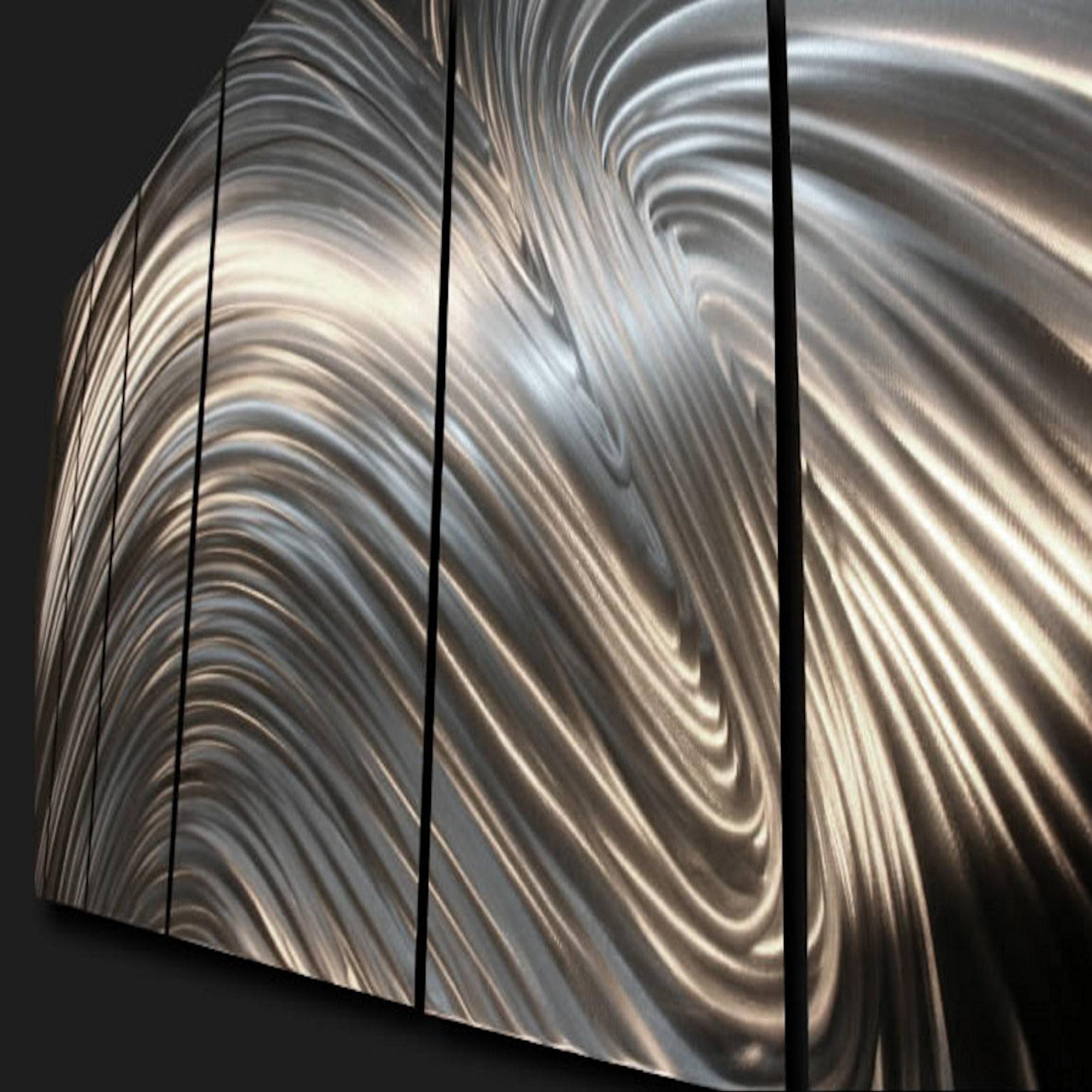 Title: Fusion 
Artist: Sebastian R.
Medium: Hand-Ground, Raw Metal Finish
5-panels hang individually. 
Overall dimensions 24