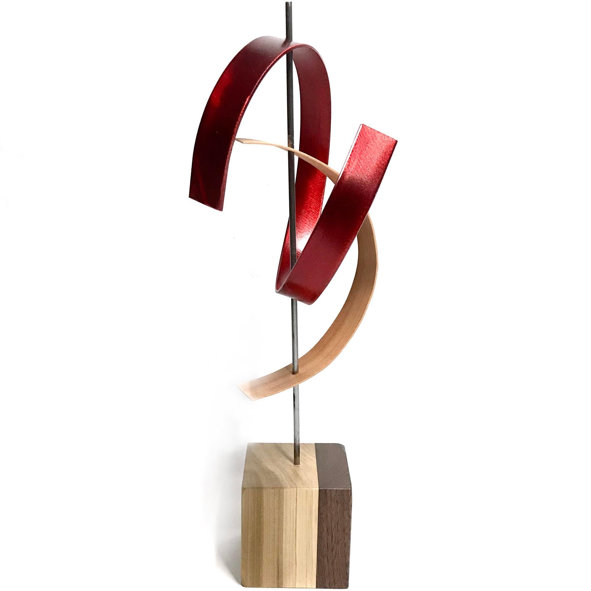 Description:  This sculpture consists of formed bent hickory and aluminum-ground slat with custom grind. Cherry with epoxy base. This sculpture is an open-edition multiple original; hand-made by the artist.
Title: Kiss

Artist Bio:
Jeff was born and