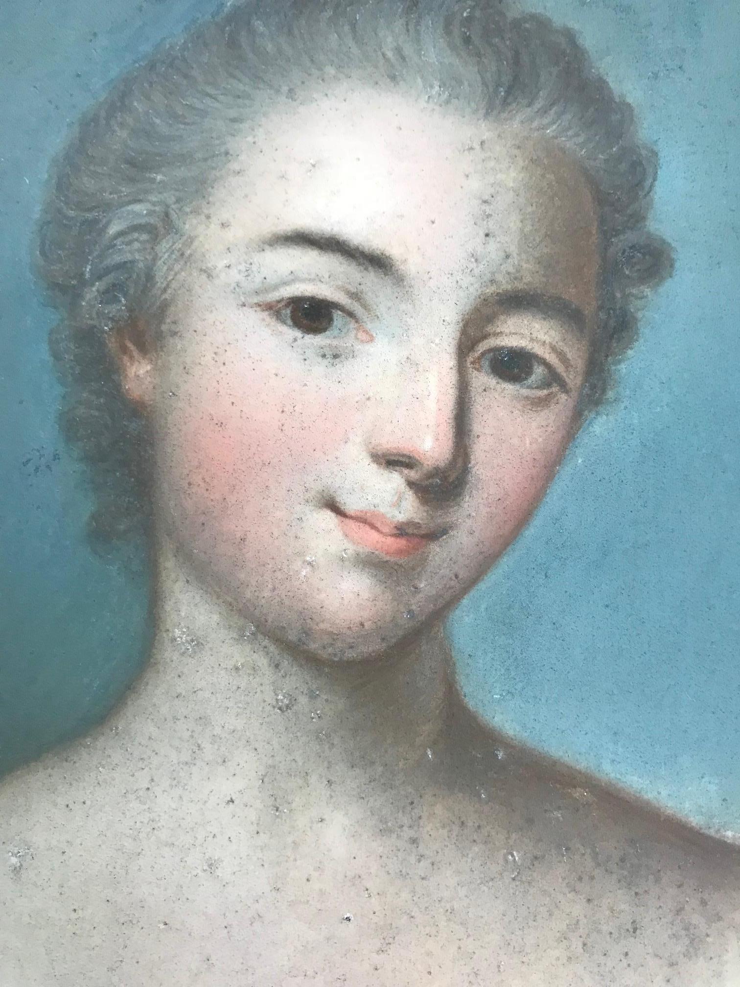 A sophisticated pastel  portrait of a noble lady. Some foxing to the paper. Would benefit from a light clean. Original wood and painted gesso frame( some damage).  In the style of Jean-Etienne Liotard.