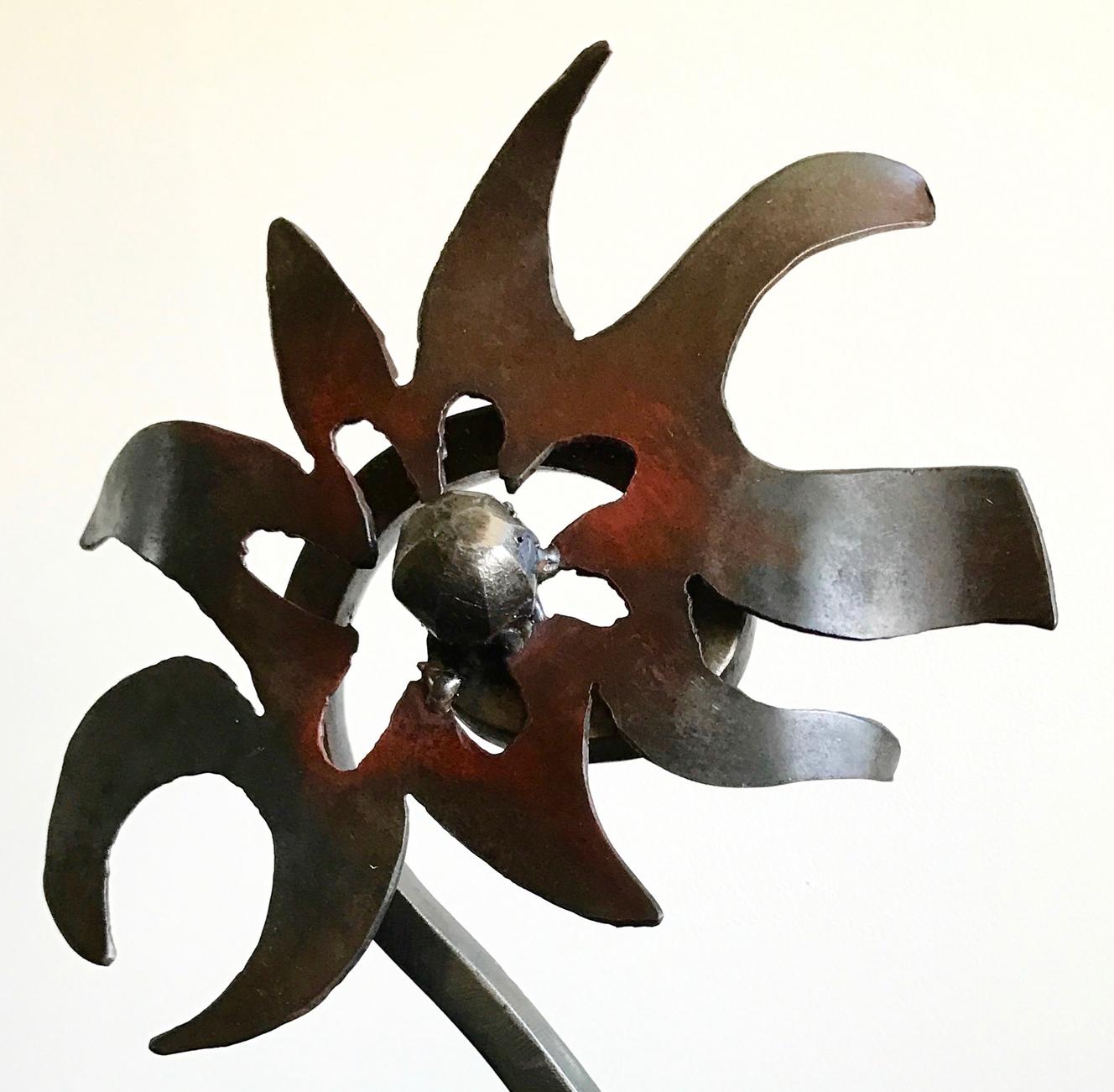 *Note - Currently on exhibition at the Plaxall Gallery until January 2020

Return of the Galactic Flower, welded steel abstraction,  conveys a monumental concept on  tabletop scale. In Rutkowski’s words, “The power if art is within each of us. It is