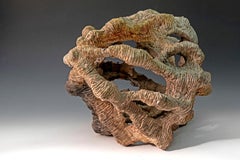 "Erosion", textured ceramic in browns and cream, embodies essential clay