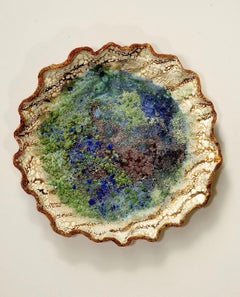 "Pond", textured ceramic in brilliant blues, greens and cream