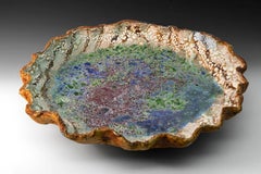 "Pond", textured ceramic in brilliant blues, greens and cream