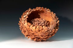 "Double Sea Flower", textured ceramic in deep pinks, embodies essential clay